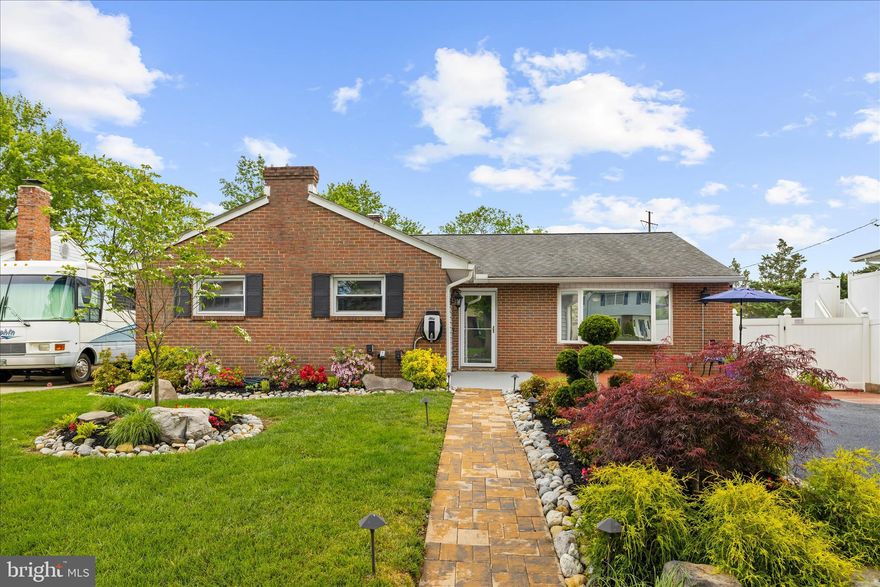 Beautiful and spacious rancher offering true main level living with four bedrooms on the main floor.  This well-maintained home features hardwood floors and sun filled bay window and fresh paint throughout the expansive layout includes a large utility room and a basement with a gas fireplace perfect for additional living or entertaining space. Step outside to a private backyard with beautiful landscaping including your own space with a garden box and a spacious patio and a gazebo with electric, perfect place to enjoy your morning coffee also a bonus the house has a generator along with EV Car Charger located on the front of the house.  It's ready for you to make it your own personal oasis.