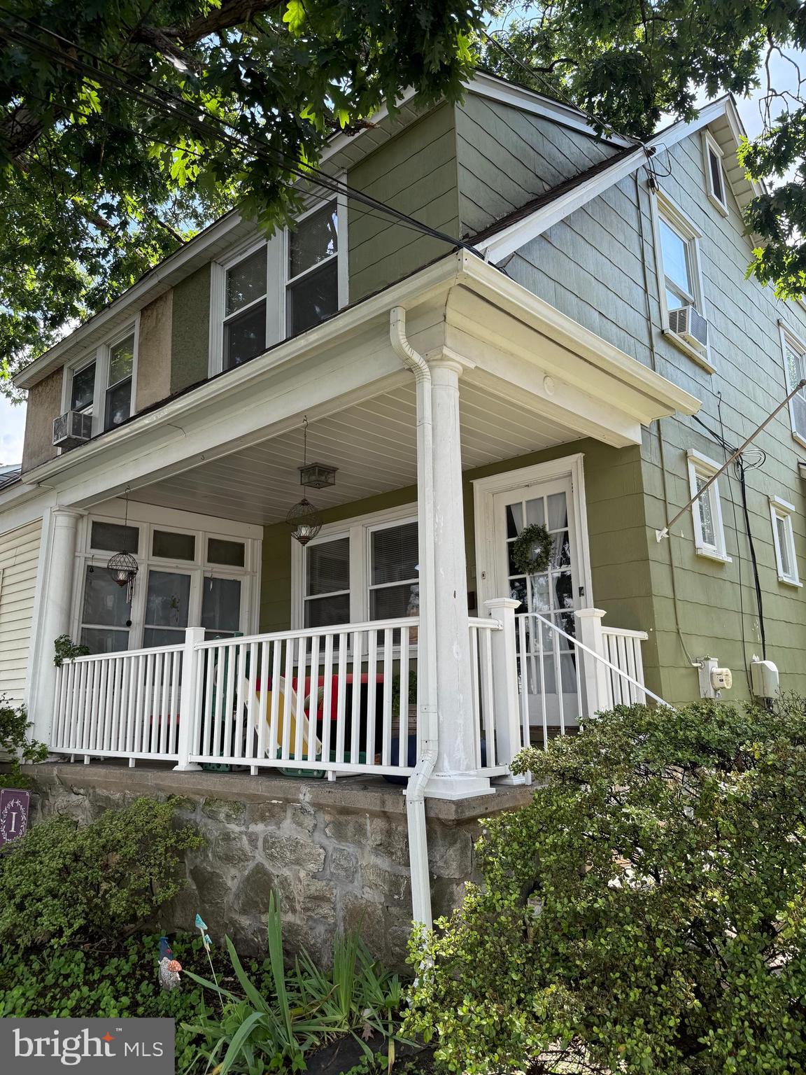Not many homes in the area have a back yard oasis. Patio, play area, designer shed, sitting area and parking spot. Completely fenced in and you can let the kids and dogs out with no worries. You'll just love spending time in the all white, bright kitchen with white cabinets, subway tile back splash and tiled floor. So clean and welcoming.It has an adjoining second porch with views of the sprawling back yard and rays of natural light. Huge dining room with HW flooring leads to the just as large living room . For everyone's convenience, there's a lovely new powder room on the first floor. Head on upstairs to the renovated full tiled bathroom and three decorative bedrooms all with hardwood flooring as well. The masterbedroom offers two closets a and a wall of built in closet storage. So much more living space on bottom floor too. The bottom floor has been utilized into it's own little haven. Laundry room, with lots of cabinets and folding area, family room and work shop. So much space in this nicely maintained twin. Come home from work, park in your personal -always open-parking spot, walk into your fenced in yard and put your feet up as you are home.