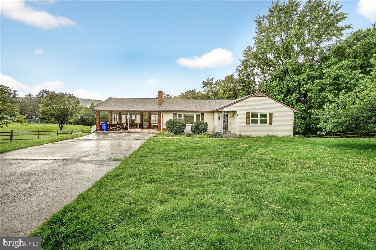 Experience the ideal blend of rural tranquility and urban accessibility at 538 Jefferson Pike, Knoxville, MD. This charming rancher offers the coveted "no city taxes & no HOA" lifestyle while being just a short drive from the cultural hubs of Downtown Frederick, the up-and-growing town of Brunswick, and the neighboring states of WV and VA.
This 5-bedroom, 2-bathroom home is a true canvas, offering a unique opportunity for a starter home, DIY enthusiast, or investor. While it's ready for your cosmetic touches to make it truly shine, you'll benefit from recent major upgrades, including a brand new roof on both the home and shed (2025), a new well water filtration system (2025), and a new HVAC & heat pump (2024). The downstairs bathroom has also been thoughtfully upgraded. The versatile second kitchen in the fully finished walk-out basement offers endless possibilities. The entire upper level received a professional enhancement, dramatically brightening and modernizing the space.
Step outside to a beautiful and spacious, well-maintained deck, accessed from the upstairs, with plenty of room to host gatherings and enjoy the nearly an acre (.78 acres) of beautiful backyard. This is a truly turn-key opportunity to embrace the peaceful country life without sacrificing convenience.