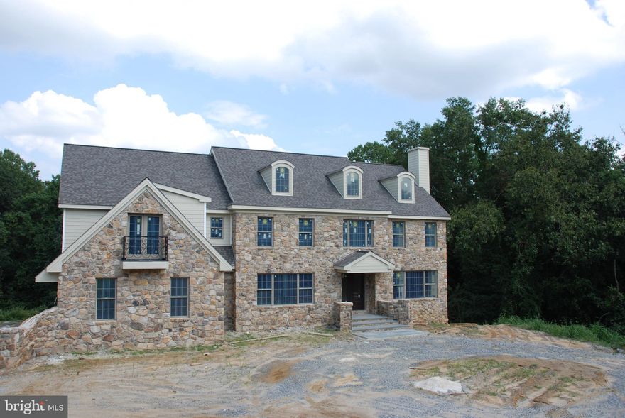 Absolutely extraordinary stone & Hardiplank home in Parker Preserve, a new home community crafted by Anthony Dambro, a well-respected longtime homebuilder in Chester and Delaware Counties. Ideally located in Pennsbury Township, Unionville-Chadds Ford School District, this 5 BR, 5.2 BA Lenape model is beautifully sited on a private cul-de-sac with dramatic views and warm natural light. Words simply don't do this property justice--its thoughtful design, impressive usable space, and attention to detail are phenomenal. Elegant see-through foyer entry with tile inlay and flanking formal living and dining rooms with arched windows and distinctive moldings. Sprawling kitchen with only the finest amenities, including Century "Vassar House" cabinetry, Wolf six-burner cooktop and double oven, two sinks, furniture-style Subzero, and polished granite, open to both the morning room and family room with access to deck and lovely views. Truly incredible butler's pantry with granite, large sink, and wine refrigerator. Main floor study plus sunroom with access to deck. Master suite with sitting room, lavish ensuite bath, walk-in closet and additional closet. Two Princess suites, one with balcony. Two additional bedrooms share Jack & Jill bath. Second floor laundry with granite, abundant cabinetry, and sink. "Signature" Dambro finished walk-out lower level with all of the bells and whistles--theater room, tiled floor, expanded wet bar with dishwasher and wine refrigerator, and full bath. Three-car garage with stone columns at driveway entrance. Three additional quick delivery homes available. Join a vibrant community and experience the quality of a Dambro home! Please note that photographs are of a previously built home in this community, and exterior and interior finishes may differ.
