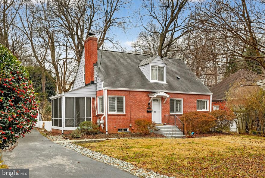This picturesque, fully updated Cape Cod offers three levels of beautifully finished living space on a large, landscaped lot with mature trees and a fenced backyard. The main level features an open, airy floor plan with a sunny living room highlighted by fireplace, stylish LVP flooring, new window shutters (2024), and access to a stunning screened-in patio. Also on this level is dining area and a gourmet kitchen boasting stainless steel appliances, white cabinetry, quartz countertops, upgraded surfaces, a custom lighted canopy hood, mosaic backsplash, open shelving, and a center island with breakfast bar seating. Two bright and spacious bedrooms and a full hall bath complete the main level. Upstairs, the oversized primary suite impresses with vaulted ceilings, a large dormer window, built-in shelving, a large walk-in closet, and an updated private bath with a tile shower. The fully finished lower level adds exceptional versatility with two bedrooms ideal for guests and rec area featuring a kitchenette with extra refrigerator, beverage cooler, utility sink, laundry area, and a full updated bath...perfect for extended living. Additional highlights include dual side entrances, an inviting covered porch, a long driveway accommodating multiple vehicles, a detached garage, newer roof (2021) and furnace (2020). Ideally located just minutes from Downtown Silver Spring, the Metro, Holy Cross Hospital, shopping, dining, and major commuter routes, this hidden gem is truly move-in ready.