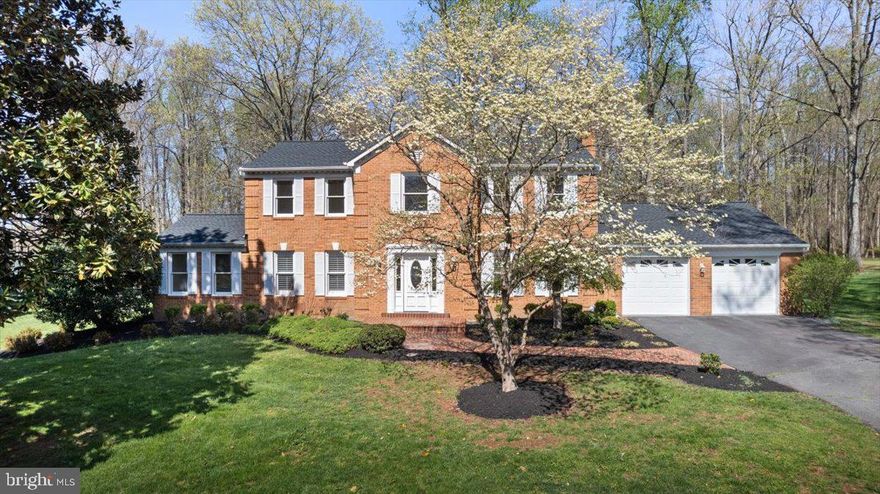 Open house has been canceled for Sunday due to Holiday- Please call listing agent for private appointment 
A mature and stately magnolia tree greets you as you arrive at this stunning brick-front Colonial nestled in the sought-after Holly Knoll neighborhood in Great Falls. Its timeless elegance, thoughtful updates and  coveted location has five spacious bedrooms, three and a half baths and is meticulously maintained.   This home is the perfect blend of classic charm and modern comfort.  NEW ROOF 2024, NEW GAS FURNACE 2022, Dishwasher 2023, Fresh paint, and new screens on porch. 

As you enter, you’re greeted by a formal living room adorned with a beautiful coffered ceiling and gleaming hardwood floors that flow gracefully through the main living spaces, including the dining room, kitchen, and family room. The formal dining room exudes sophistication, featuring refined crown molding and decorative shadow boxes—perfect for hosting memorable dinners and holiday gatherings. There is a wonderful main level office, additional bedroom, or flex space that is perfect for your creative needs! 

The heart of the home is the beautifully updated kitchen, designed to inspire culinary creativity with its stainless steel appliances, center island, and sunny breakfast area. From here, step out to the serene screened-in porch overlooking a lush, landscaped backyard oasis. Framed by mature trees and highlighted by a charming gazebo, this peaceful retreat backs to acres of protected community parkland, offering both breathtaking views and exceptional privacy.  

Upstairs, the primary suite provides a tranquil escape, complete with a walk-in closet, featuring a separate dressing area and bathroom. Three additional well-appointed bedrooms and a full hall bath round out the upper level, offering ample space for family, guests, or a home office.  

The un-finished lower level expands your living space with a full bath, brick bar area, and plenty of room for a home theater, game room, gym, or custom retreat tailored to your lifestyle.  

Ideally located just off Route 7, this home offers easy access to Great Falls Village Centre, Reston Town Center, Sugarland Crossing, Loudoun Town Center, the Metro, and Dulles Airport. Whether you're commuting, traveling, or simply enjoying the area's upscale shopping and dining, everything you need is within minutes.  

Elegant, updated, and perfectly situated—this Holly Knoll gem offers refined living in one of Northern Virginia’s most desirable communities.