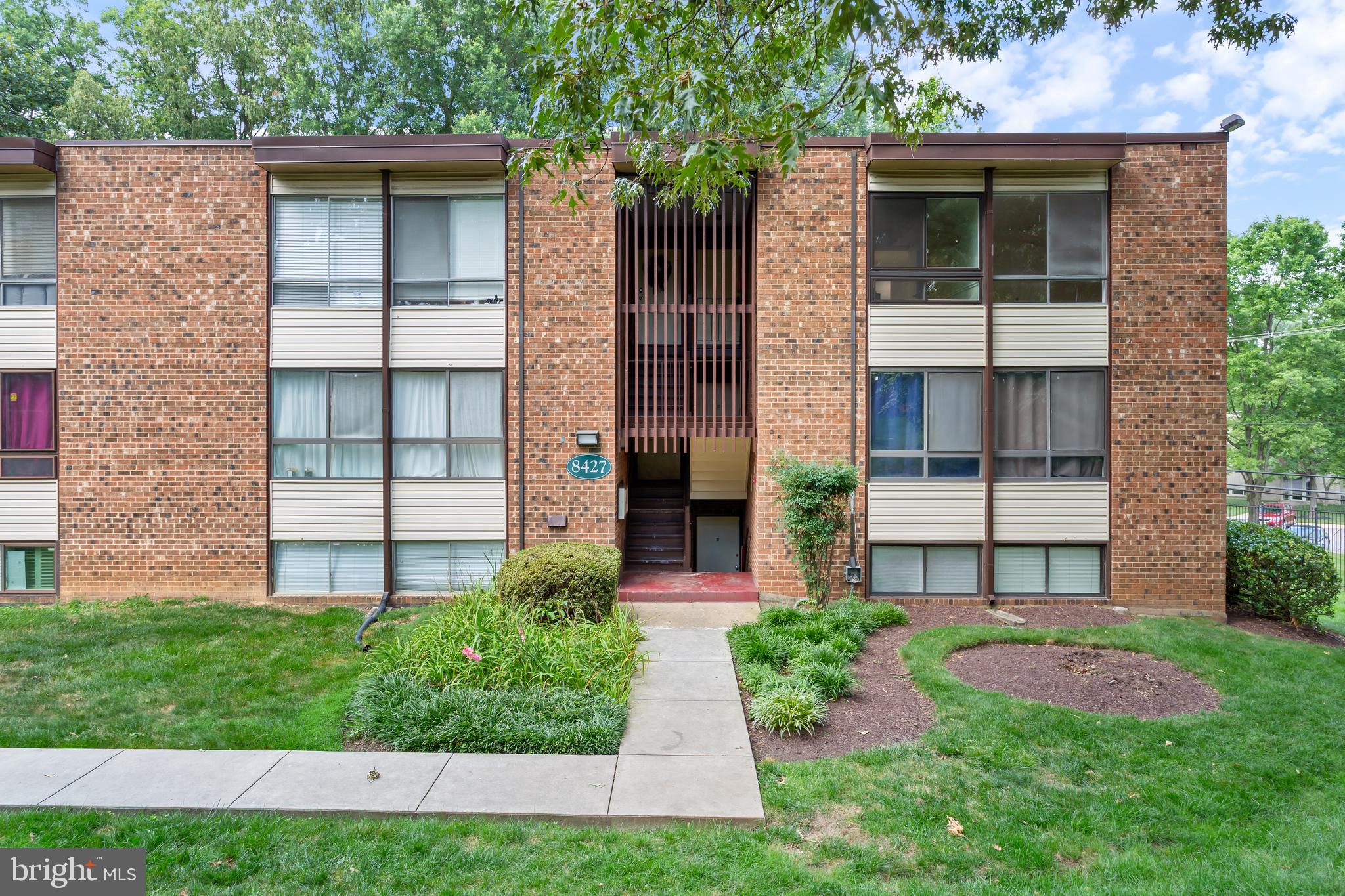 Welcome home, where comfort meets convenience in this rarely available 3-bedroom, 1-bathroom unit. Tucked within a peaceful, amenity-rich community featuring a pool and tennis courts, this home is a true gem. Inside, you'll find a thoughtfully updated and modern kitchen and bathroom, accented by rich laminate flooring throughout the living spaces and an eye-catching exposed brick feature wall in the living room—adding character and warmth to the space. The kitchen features stainless appliancea and a washer dryer for added convenience. French doors extend the living experience outdoors, opening to a private sanctuary embraced by lush greenery and tranquil surroundings.. Two of the bedrooms have been freshly outfitted with plush new carpeting, offering a soft touch and added comfort. Flooded with natural light from oversized windows, the home boasts a warm, inviting atmosphere that’s perfect for relaxing or entertaining.
Whether you're lounging poolside, rallying on the tennis court, or enjoying the peaceful vibe of your own garden-view escape, this condo is ready to be your next chapter.
Whether you're enjoying the ease of condo living or taking advantage of nearby shopping, dining, and commuter routes, this stylish and spacious unit is a standout.