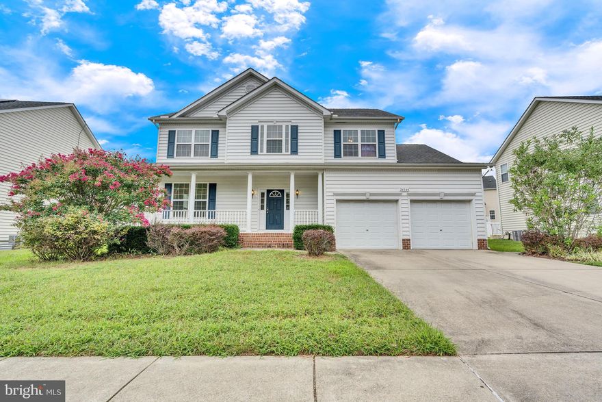 Welcome to Broad Creek Drive!  Enjoy three finished levels of  indoor living space plus outdoor space including the covered front porch and rear deck overlooking the level and fully fenced back yard.  Inside you will enter the hardwood foyer and head straight back to the gourmet kitchen open to the family room making entertaining a breeze.  The kitchen is the heart of the house here with a center island, granite counter tops, gas cooktop range, wall oven and newer ss appliances.  Storage will never be a problem with the extra cabinet space and spacious pantry.   Relax in the family room with gas fireplace or head to the formal dining room for a sit down meal.  This level also includes a flex room which can be used as a sitting room or home office, a half bath and a mudroom with laundry leading to the two car garage.  Upper level gives a private primary suite with walk in closet with built ins,  full bath with two separate vanities, soaking tub, tiled walk in shower, and water closet.  Three additional bedrooms and full bath in hall finish off this level.  Lower level finds a rec room with surround sound speakers, fifth bedroom, third full bath, storage, and a walk out to the rear yard.  Fresh carpet and paint throughout.  This home has room for everyone and is  located in the highly sought after Broad Creek community, excellent schools, very walkable with sidewalks throughout and a quiet suburban feel, yet close to shopping, restaurants,  NAVAIR and so much more.  See floor plans in photo section for layout and room sizes.