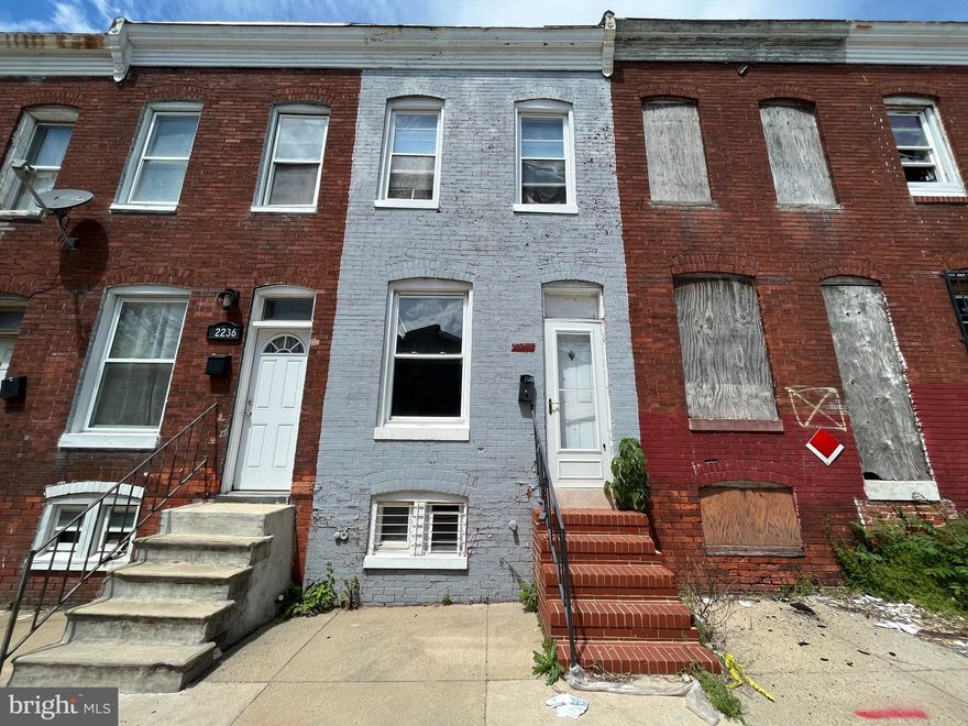 ONLINE AUCTION: Bidding begins 10/31/2025 @ 10:00 AM. Bidding ends 11/4/2025 @ 12:50 PM. This two-story brick townhome at 2234 Booth St is located in Baltimore's Boyd-Booth neighborhood. The property is currently vacant. Nearby attractions include Gwynns Falls Park. Major traffic routes in the vicinity include West Baltimore Street and South Monroe Street, providing access to downtown Baltimore and surrounding areas.