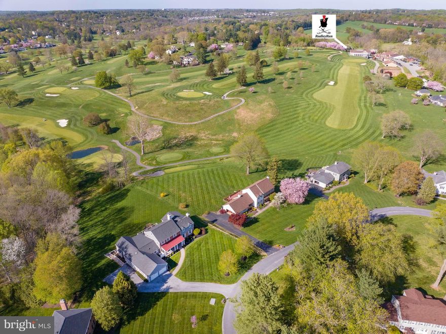 Welcome to 812 Hessian Circle, West Chester, PA 19382 - a beautifully expanded and updated home located in the highly sought after subdivision of Radley Run. This stunning 4-bedroom, 3.5-bathroom house sits on a quiet cul-de-sac and boasts over 4500 square feet of living space. Truly a turn-key, move in ready home. Updates include all new windows, roof, exterior siding, freshly painted interior and new carpeting in the bedrooms & finished basement area. Situated in the best location in Radley Run, a quiet cul-de-sac where you can enjoy the changing seasons amid panoramic views overlooking the golf course and Brandywine River. Sitting on the newly added large maintenance-free composite deck with cable railing system one can take in the 17th green with a pond below and the18th fairway leading up to the new clubhouse in the distance. 
The open-plan gourmet kitchen features high end stainless steel appliances, loads of custom cabinetry, granite countertops, and a large center island with seating for 6-8 people. This space is perfect for hosting family dinners, entertaining friends or holiday parties. Integrated seamlessly into the open plan is the large great room addition featuring a vaulted ceiling, exceptional reclaimed hardwood plank flooring, gas fireplace and an area perfect for a large farmhouse table. Adjacent to this area is a butler's pantry with a handsome butcher block countertop, wet bar and dishwasher. The main level also features a sunroom/home office, living room, dining room, powder room, mudroom Make your way upstairs to the large primary bedroom suite, featuring a sitting area, large walk-in closet, an en-suite bathroom with oversized shower, soaking tub and dual vanity. Three additional bedrooms and two full bathrooms complete the upper level of this beautiful home. 
The laundry is conveniently located on the second floor, plus there is an additional hook up in the 1st floor mudroom. The partially- finished basement offers endless possibilities - play room, home theater, exercise space, plus the large golf-cart garage.
The prime location of the home within the Radley Run community and its 1.6 acre lot provides a safe place for walking the tree-lined neighborhood. The classic feel of this established Chester County locale is evident. Invite neighbors to socialize on the beautiful covered front porch. Walk, bike or take your own golf cart to the clubhouse. No need to take your clubs off the cart after golf, simply drive into your dedicated golf cart garage space and charge it up for your next round.
This home has it all: completely updated in the top-ranked Unionville Chadds-Ford Schools, easy access to shopping and dining in West Chester, Kennett Square, Chadds Ford and Delaware. Pocopson Elementary is just a 4 min drive away. Minutes from Rt 202, easy commute to Wilmington, King of Prussia or Philadelphia, but a world away. Radley Run is a wonderful community that features a wide range of amenities such as an 18-hole golf course, clubhouse, pool, plus paddle and tennis courts. This truly checks all the boxes - Five Star location, condition and amenities. Schedule your tour today!