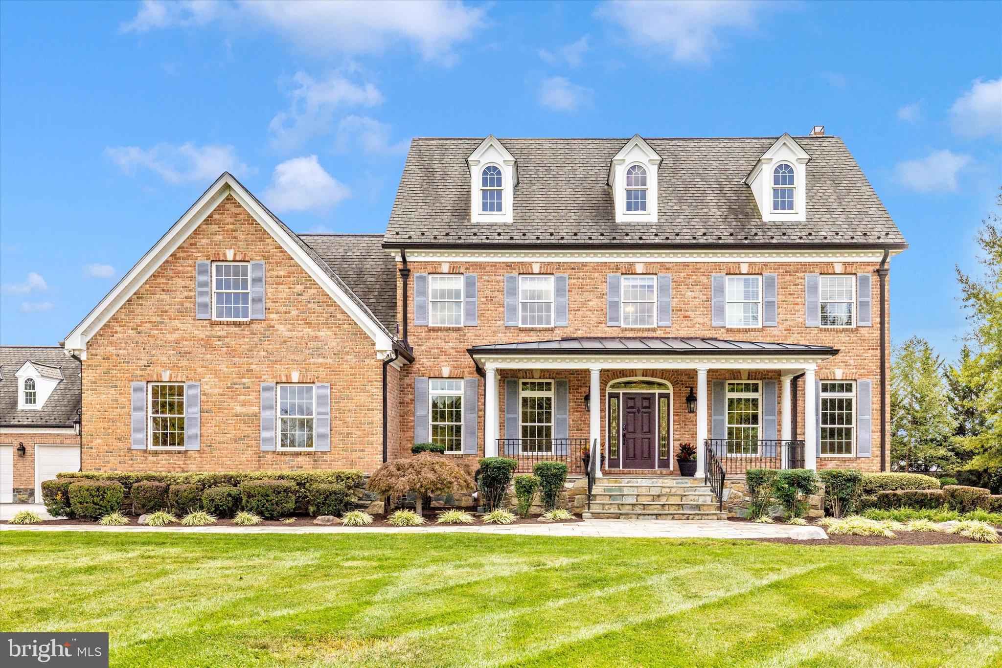 Welcome home to 10036 Old Frederick Terrace! This stunning property features a breathtaking 4-level 5 bedroom 4 1/2 bathroom main residence, a detached oversized 3-car garage with a 1 bedroom 1 bathroom 1,100 square foot upper level accessory unit, and an extraordinary outdoor entertainment space like you've never seen before! First, stepping into the entry level of the main residence you'll find gorgeous newly refinished hardwood floors spanning your formal living and dining rooms, incredible gourmet kitchen with high-end Viking and Thermador appliances, and inviting sunroom. The main level also features an enormous pantry, spacious mud room with laundry, and guest half bath. Making your way to the first upper level you'll find your primary suite with dual walk-in custom closets and private full bath, a secondary bedroom suite with private full bath, plus a third and fourth bedroom with shared full bath. The second upper level offers a rec area and additional bedroom suite with private full bath.  The lower level of the home is unfinished, but offers endless possibilities with elevated ceilings, a fireplace, and a rough in for a full bath and wet bar. Making your way outside you'll fall in love with the incredible outdoor space featuring a deck, spacious patio, hot tub, custom fireplace, a billiards garden, and a sprawling yard with a dense tree-line for privacy. The oversized detached 3 car garage offers plenty of space for a business owner or car enthusiast, with a surprisingly luxurious upper level accessory unit featuring a large living area, secondary kitchenette, bedroom and full bathroom. This truly one-of-a-kind property offers all of this in a convenient location, just off Route 15, less than 15 minutes from Downtown Frederick, plus there's no HOA! Don't miss out on your chance to call this stunning property your very own!