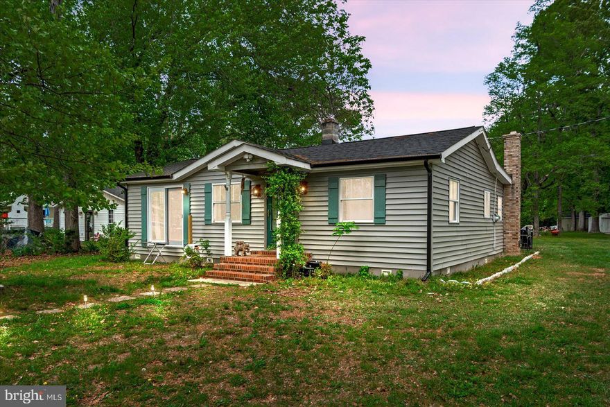 Welcome to 95 Main St., a beautifully renovated 2-bedroom, 2-bathroom home with waterviews and a fantastic location in north Stafford.  Whether you’re looking for a full-time residence, a weekend retreat, or a smart investment property, this home offers the perfect blend of comfort, convenience, and lifestyle. Fully updated in 2024, this turn-key property features brand-new vinyl siding, a new roof, updated electrical and A/C systems, and newly installed subfloors and joists—giving you peace of mind for years to come. The two spacious bedrooms are complemented by two beautifully remodeled bathrooms—one with a soaking tub for relaxing evenings, and the other with a sleek stand-up shower. Newly installed windows throughout the home invite in natural light and provide scenic views of the peaceful surroundings. Situated just minutes from a commuter lot and VRE, major commuter routes like I-95 and Route 1, you’ll enjoy quick access to Quantico, Northern Virginia, and Washington, D.C. You’re also close to shopping, dining, and everyday amenities.  Outdoor enthusiasts will love being near Crow’s Nest Natural Area Preserve, perfect for kayaking and nature walks, as well as Aquia Landing, offering sandy beaches, picnic areas, and stunning water views. Explore nearby historical sites like Government Island and Ferry Farm, George Washington’s boyhood home. Community residents also enjoy waterfront access to Accokeek Creek, perfect for paddling or quiet mornings by the water. With its modern upgrades, peaceful waterviews, and incredible location, 95 Main St. is a rare opportunity. Whether you're looking for your next home, a relaxing getaway, or a high-potential Airbnb or rental property, this one has it all—move-in ready and packed with possibilities.