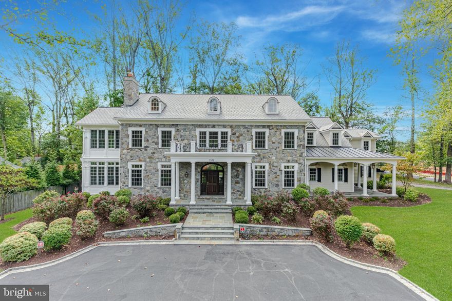 Langley House, established in 1719 by Thomas Lee, renowned for Stratford Hall, honors his ancestral estate in England. This 10,000 square-foot estate, set on over an acre in the exclusive Langley Forest neighborhood, blends 18th-century grandeur with 21st-century style.
The elegant interior features a stately entrance hall, a magnificent dining room, a refined living room with a wood-burning fireplace, a bright family room, and a gourmet chef's kitchen with a butler's pantry. The main level also includes a paneled study, a sunlit conservatory, a secondary office, and two powder rooms. The upper level boasts a luxurious owner's suite with a sitting room, two walk-in closets, and an opulent bath, along with four additional bedrooms, each with its own full bathroom. The lower level features a recreation room with a stone fireplace, a fully equipped bar, a sixth bedroom with a full bathroom, and a large unfinished area for future projects.
The exterior matches the interior's high quality, with a spacious backyard, a stone patio, and room for a pool or other enhancements. Two parking courts and a three-car garage complete the amenities. Located less than 2 miles from McLean and under 8 miles from Washington, DC, Langley House is a distinguished offering in contemporary McLean, Virginia.