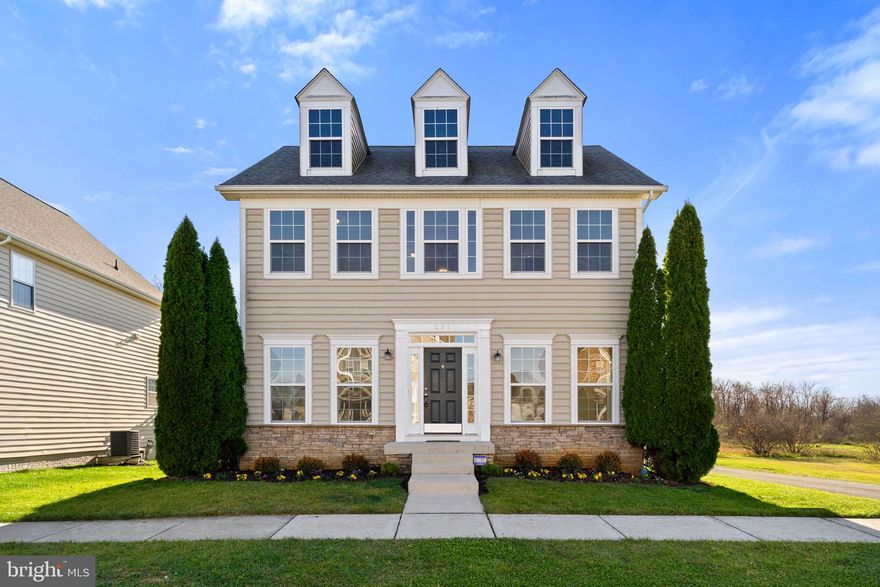 This cheerful 3 bedroom, 2.5 bath colonial sits on a corner lot in Huntfield, one of Charles Town’s most popular neighborhoods with sidewalks, streetlights, a nearby playground, and the future community pool just a short walk away. Hardwood floors welcome you inside, where the upgraded kitchen features stainless steel appliances, 42" cabinets, and plenty of room to cook and gather. The kitchen opens to the family room, creating an easy layout for everyday living around the cozy gas fireplace.
Upstairs, the primary suite offers a relaxing retreat with a walk-in closet and an en suite bath that includes a double vanity, separate shower, and a large soaking tub. Two additional bedrooms, a full hall bath, and the conveniently located upper-level laundry—washer and dryer included—complete this floor.
The partially finished lower level adds flexible space with a media room equipped with surround sound and a window with ladder access for emergency egress. A rough-in bath offers room to grow, while the unfinished areas provide generous storage.
Additional features include a detached two-car garage with opener, abundant natural light throughout the home, and an electric heat pump system that keeps the home comfortable year-round. With its friendly neighborhood setting and thoughtful features throughout, this Huntfield home is ready to welcome its next owner.