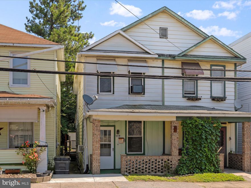 You won't find a better value than this!  This 3 bed / 2 bath home features a rear deck, hardwood floors, new flooring in the kitchen, bedrooms, and baths and an oversized 1 car detached garage!