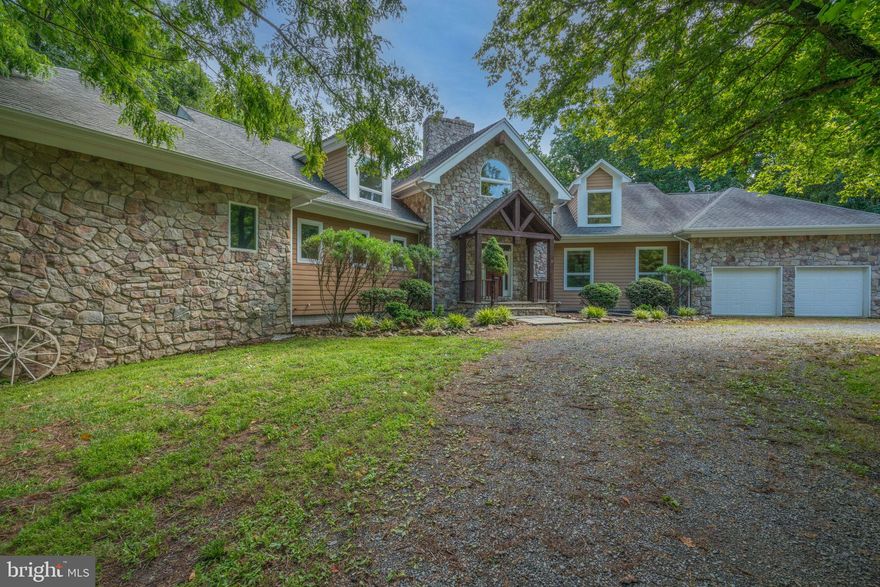 PRICE REDUCTION!  Great opportunity to own a beautiful home in Loudoun County.  Minutes to Leesburg and major roadways.   Come enjoy luxurious living in the desirable neighborhood of Goose Creek Farms. This captivating  five bedroom, four and a half bathroom contemporary chalet-style home turns on the charm as you cross the threshold. Within, you'll find an impressive entryway with natural slate stone flooring.  Refinished hardwood floors and new carpet provide warm flooring in the living areas, reflecting plentiful natural light. The interior designer of the household will appreciate the creative possibilities presented by the neutral palette of the current decor. The eye is drawn to vaulted ceilings, floor to ceiling windows across the back of the house, and a floor to ceiling stone fireplace.  These add spaciousness and promote a comfortable airflow. Nothing says book, nap, or conversation like crackling fireplace warmth, which can be found in the Great room, loft or by the wood-stove in the lower level.
The large chef-inspired kitchen fuses marvelous counter space and major appliances, ready to follow your culinary directions. Conveniently located on the main-floor, the primary bedroom offers welcome respite as the days begin. In addition to the convenience of the private bathroom (separate tub), you will find plenty of walk-in closet space and ample dedicated space in the abundant cabinetry. The second bedroom space next to the primary bedroom is perfect for a nursery or convert it to a luxurious closet.  The other three bedrooms, ensuite and with plenty of closet space, offer the luxury of private space.
The finished walkout basement, with the convenience of a full bathroom, currently serves multiple purposes as recreation room, guest sleeping quarters, and home theater. The second kitchen area makes this space perfect as an au pair or in-law suite.  It would be a simple matter to reconfigure this bonus space however you please.  
With fencing in the rear, the large yard offers privacy and room for enjoyment. A circular driveway (no backing out!) makes for a grand welcome, and is connected to an attached two-car garage.  The outbuilding can serve as an area for a workshop or potential home-business location.  Grill, cooler, and household chef make for a natural trio on the deck, which is dependably crafted of composite materials. This home is a blank canvas for your lifestyle and memories!  
Cross the threshold into a pleasant new life here in Leesburg.

This is an Estate Sale and is being sold AS IS.   The property is zoned AR2.   Per Loudoun County, there can be one accessory dwelling unit built up to 2,500 square feet on the property.    There are multiple uses for this type of property.  See documents for AR2 Zoning information.  Confirm with Loudoun County regarding any zoning use for this property.