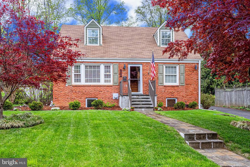 EXCITING NEW LISTING.  Wow! Sited on a spectacular 1/3-acre lot, this lovely Cape with approximately 2150 square feet of finished living space on 3 light-filled levels, features 4 bedrooms (including a main level primary bedroom) and 3.5 baths.  A thoughtful and elegant remodel by the current owners, the home lives large with an open floor plan design that integrates seamlessly with the outdoor living spaces.  The upper level boasts 2 spacious bedrooms and a hall bath.  The lower level, with engineered walnut flooring, includes a warm and inviting recreation room with gas fireplace, bedroom 4, a craft area with expanded countertop space and sink, laundry area, and a spa inspired bath. The outdoor spaces are special with a large, covered flagstone patio, lush gardens and plantings, steps to a second private patio, and a natural gas connection for those who love outdoor cooking.  The newly constructed oversized garage features a workshop area, abundant storage options, an additional half bath, utility sink, and a separate 575 square foot art studio or home office. The home is perfect and ready for you to enjoy!  OFFER DEADLINE MONDAY 4/19 AT 4PM.