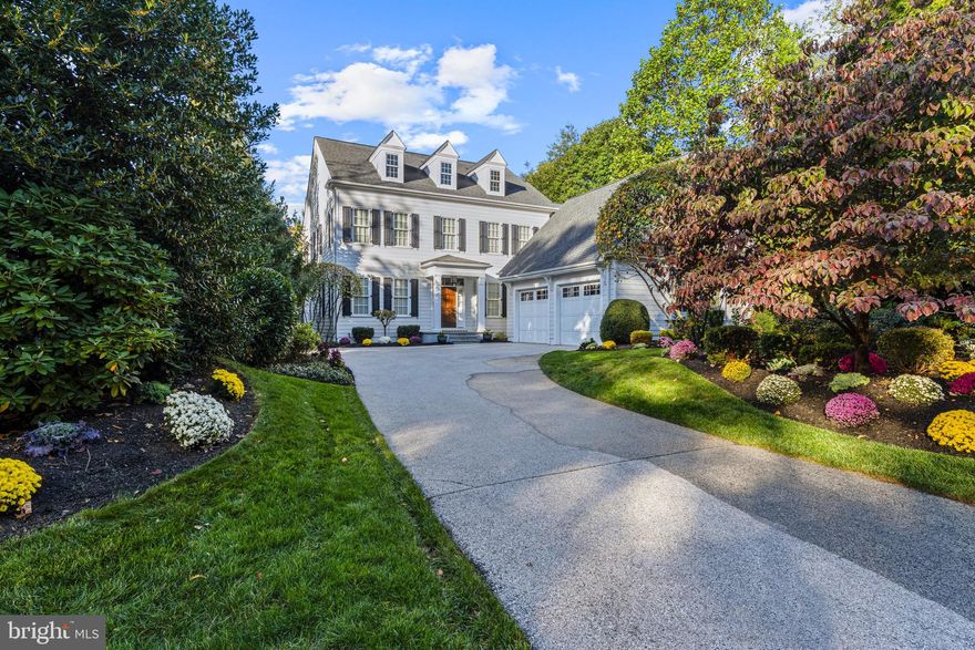 Welcome to 1436 County Line Road! This beautifully-appointed home in RadnorTownship offers timeless elegance, exceptional craftsmanship, and an unbeatable Main Line location. Perfectly positioned within walking distance to the Rosemont Station, Villanova University, and the charming shops and restaurants of downtown Bryn Mawr, this residence delivers both luxury and convenience.

Meticulously maintained and in excellent condition, the home welcomes you through a gracious front hallway showcasing rich hardwood floors that flow throughout the main level. The living room exudes sophistication with crown molding, grasscloth-style wallpaper, and recessed lighting, creating a warm yet refined gathering space. The formal dining room features custom lighting, elegant sconces, detailed moldings, and seamlessly connects to a well-appointed butler’s pantry complete with a wet bar.

The heart of the home is the stunning chef’s kitchen, designed for both everyday living and entertaining. Marble countertops and a generous center island complement a premium Wolf six-burner range with griddle, a vented hood, and picturesque window built into the tiled backsplash. A Sub-Zero refrigerator and sunlit breakfast room complete this exceptional space. Just beyond, the inviting family room offers custom built-ins, a gas-burning fireplace, and a glass door opening to a private flagstone patio with awning and a fully fenced-in rear yard.

A thoughtfully designed mudroom with built-in cubbies, powder room, coat closet, and access to the oversized two-car garage enhances daily living. A rear staircase with an office nook leads to a versatile guest suite with full bathroom and wetbar—ideal as an in-law suite, au-pair quarters, home office, or gym.

Upstairs from the main hallway, the serene primary suite features a tray ceiling, surround sound, two large walk-in closets with built-ins, and a spa-like bath with dual vanities, soaking tub, and frameless glass shower. Two additional bedrooms each offer ample space, double closets and en-suite bathrooms, each with a shower/tub combination. A convenient hall laundry room with sink and a hall linen closet complete this level.

The finished lower level is carpeted with excellent ceiling height and provides multiple living/entertaining areas, an abundance of natural light, and a half bathroom. Also included on this level is an unfinished area with outstanding storage and well-maintained mechanical systems, including 2 high-efficiency HVAC systems (4 zones total) and a backup generator.

Move-in ready and impeccably styled, this 'must-see' Main Line home offers refined living in an extraordinary location!