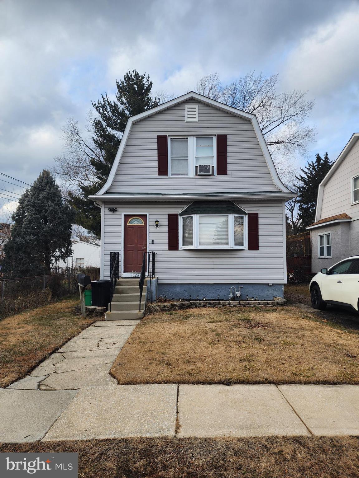 Now for sale in Folcroft! This detached Dutch style home is conveniently located just blocks from the Folcroft train station and close to major roadways for easy commuting to surrounding areas. The main floor includes a large carpeted living room that leads to the dining area, kitchen with ceiling fan and recessed lighting, and powder room. At the back of the house, you'll find the sun room with ceiling fan - a fantastic place to relax with family and friends year-round! Upstairs, there are 3 bedrooms and hall bath. Additional features include unfinished basement with laundry area, large backyard, and driveway parking. The home does need some TLC but has a newer roof. Schedule your showing today!