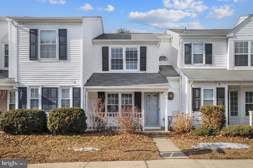 Enter through the covered front porch into the foyer, which leads to the kitchen and main living area with a fireplace. The first floor features a convenient half bath and coat closet. The spacious eat-in kitchen is equipped with a stainless-steel range, microwave, and dishwasher. An opening above the kitchen sink overlooks the dining and living rooms, creating an open and inviting layout. Sliding glass doors lead to a private, fenced backyard—perfect for grilling, relaxing, or entertaining. A storage room is conveniently located in the yard.
The staircase leads to the second floor, which includes a spacious primary bedroom, a second bedroom, a full bathroom, and an upstairs laundry area.
Enjoy community amenities including swimming pools, tennis courts, and playgrounds. Located within the Council Rock School District.