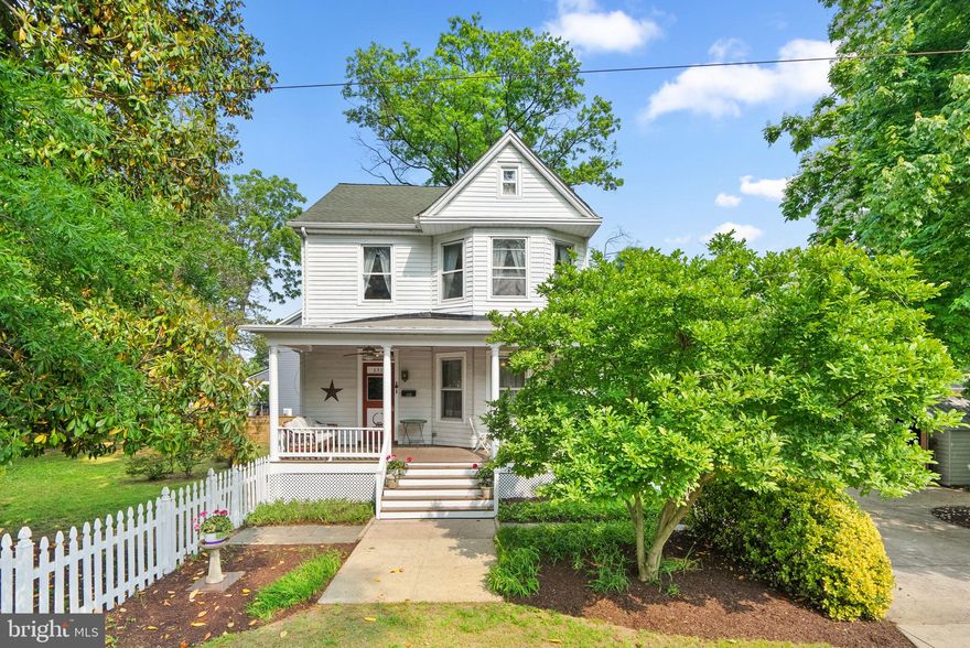 This is the one you have been waiting for! This beautiful Colonial located in Riverdale Park is full of historic charm and modern updates. You will love the tall ceilings, the warm glow of the wood floors and the light streaming in from all the windows.  Welcome guests into your foyer with original woodwork and tall ceilings. In addition to a traditional library and connecting living room, the main floor has been expanded to allow for an over-sized, eat-in kitchen featuring granite countertops and stainless steel appliances. An luxurious new bathroom has been added as well.  The upper level features 4 more bedrooms, another full bath. Go up one more level to the bonus space with kitchenette, full bath and tons of light. The home's layout accommodates a variety of living combinations: whether you want to use the entire home yourself, need a mother-in-law suite or would like separate, private spaces for roommates or guests. The lower level is ready to be finished however you like, it's a blank canvas. The outdoor space is just as versatile, whether you are sitting on your deep front porch, or enjoying the large, fenced-in yard. The house is nestled on a quiet street, a couple of blocks from Riverdale Community Park with Waggertail Dog Park. It's also less than a mile to Whole Foods, dining & shopping.