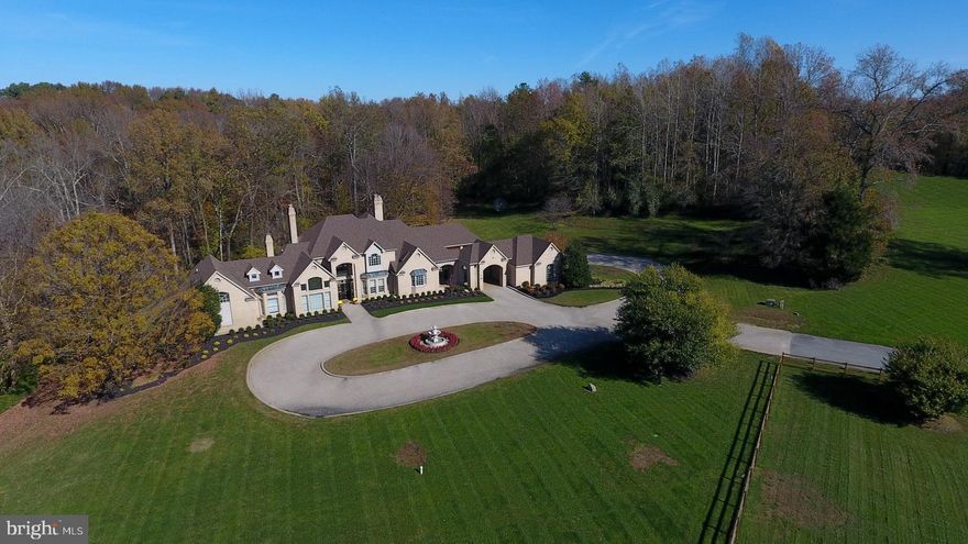 DAVIDSONVILLE CUSTOM BUILT PRIVATE HOME ON NEARLY 6 ACRES- FIRST TIME ON THE MARKET! As you enter the grand foyer of this one of a kind home, you're greeted with a great room perfect for entertaining. The wet bar, high ceilings & 1 of 3 gas fireplaces are just a few of the features your guests will love about your home. Gourmet kitchen with granite countertops, center island, soft closing cabinets/drawers, walk in pantry, wine rack & under & over cabinet lighting. Stainless steel appliances includes refrigerator, 2 dishwashers, 2 ovens, electric cooktop, built in microwave & trash compactor. You will love the warmth of the heated floors throughout the whole house. One level living featuring an expansive first floor master suite w/ vaulted ceilings, gas fireplace, walk in closet & master bath w/ marble floors & countertops. 2 bedrooms upstairs connected by a full bath. Private balcony off second floor overlooking the nature filled backyard. And the list keeps going! This property has plenty of parking between the 2 car attached garage, 2 car detached garage and large, circular paver driveway. Other amenities include recessed lights, irrigation system, large main level laundry room & generator. Community is in the process of creating HOA-it will be disclosed once finalized.