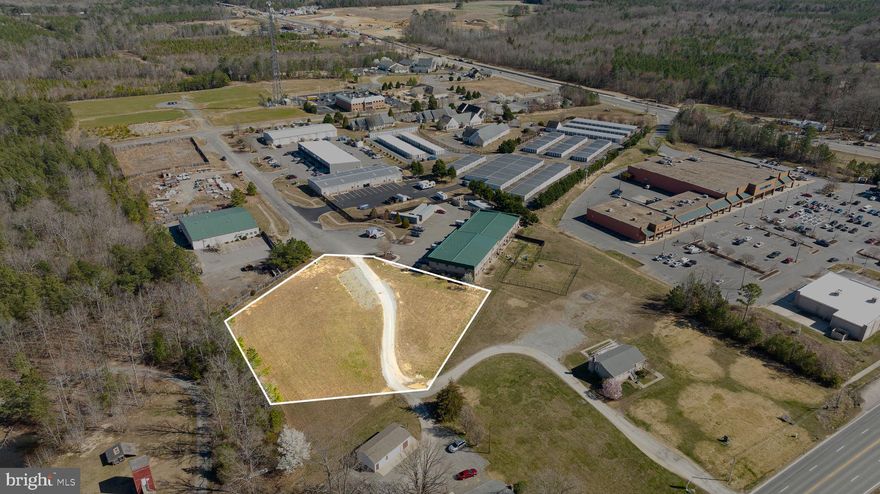 CHECK OUT THIS GREAT LOCATION NOW OFFERED IN THE LADYSMITH INDUSTRIAL PARK.  1.51 ACRES WITH NICE SIGHT LINES FROM ROUTE 1 AND HAS ROAD ACCESS THROUGH THE COMMERCIAL PARK AS WELL AS GIVING YOU TWO ENTRANCE POINTS TO THE LOCATION.  WATER, SEWER, AND POWER ARE AVAILABLE ON THE LOT.  STORM WATER GOES TO THE DITCH WHICH LEADS TO THE RETENTION POND OUT ON LADYSMITH RD.  
ENVISION HAVING YOUR BUSINESS OFF THIS WIDELY TRAVELED CORRIDOR JUST OFF ROUTE 1.  SCHEDULE YOUR SHOWING TODAY TO SEE WHAT THE POSSIBILITIES ARE.