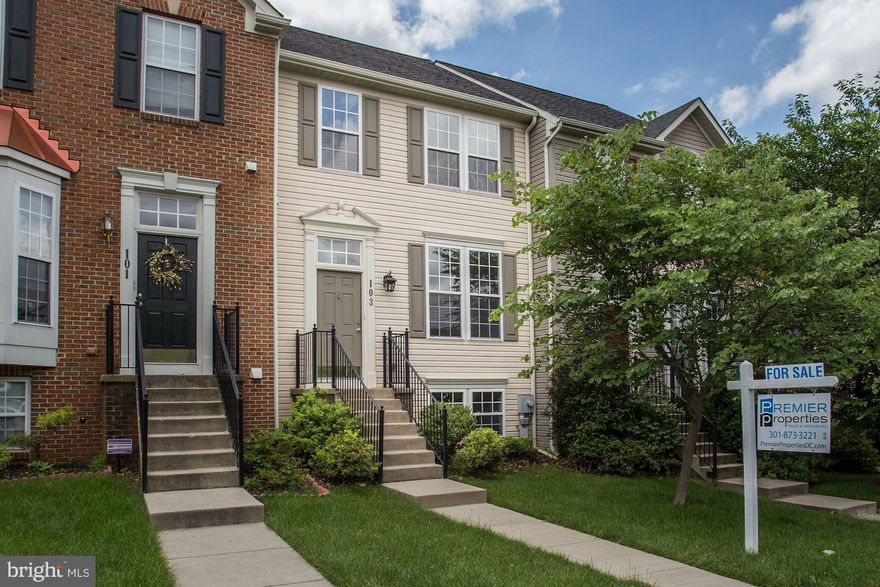 GORGEOUS! Freshly renovated Galyn Manor townhome with finished walkout basement features 3 full level bump-outs, gourmet kitchen with white cabinets, new stainless steel appliances, and new granite counters; new wood floors, new plush carpet, new light fixtures, fresh paint throughout, and deck to level yard. Owner suite features siting area, spa bath, and large walk in closet.