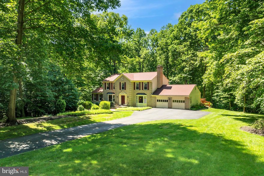 Welcome this stately brick front colonial home to the market.  Situated on a beautiful and rare, almost 3 acre lot in the back of the neighborhood, surrounded by majestic trees, this beautifully maintained home is ready for a new owner to put their own stamp on it.  A great floor plan that mixes a more traditional layout with some open concept areas boasts spacious formal living and dining rooms, a bonus den on the main level that was an upgrade when built and is the prettiest room with plenty of windows and natural light.  A gourmet kitchen with peninsula provides plenty of cabinet space for storage and countertop space for prep and everyday living.  An informal dining space is nestled inside another upgraded element; a fabulous bump out/bay window that provides access to the awesome deck beyond.  Oversized and well maintained, the deck provides views of the idyllic backyard surrounded by mature trees.
Back inside an informal family room with brick wall and wood burning fireplace, main level laundry room, 2 car garage and full bathroom completes the main level of this lovely home.
Upstairs, a spacious primary suite has plenty of closet space and an ensuite bathroom.  Down the hallway, 3 additional bright and cheerful bedrooms each illuminated by lovely natural light, has great closet space and shares the beautifully appointed hallway bathroom.
The lower level is unfinished with a rough in for a full bathroom if desired, and echoes the expansive floor plan of the upper levels with a charming wood stove already installed.  A sliding glass door provides walkout access to the patio beyond, and grants ease to entertain, relax or play in the spacious and glorious flat yard. 

Being sold AS-IS

UPDATES/AGES - HVAC - 2019, Hot water heater - 2022, Roof - 2019, Septic boxes just got replaced in April 2024, and a riser was added to the main tank.

TRANSPORT - 25 minutes to Dulles Airport, 20 miles to the Pentagon, 4.4 miles to Burke VRE, 9.6 miles to the Vienna Metro.  Easy access to Fairfax County Parkway, Ox Road, 495 and I-66.
All information is deemed reliable, not guaranteed.