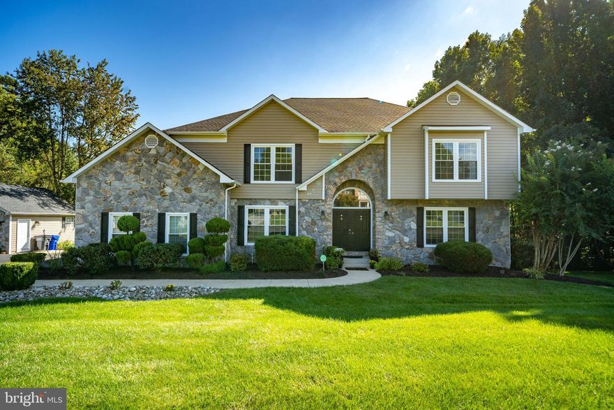 Gorgeous home in Berry Hill Manor. This home sweet home features 6 bedrooms, 5 full baths, finished basement w/ 2nd kitchen, walk out level basement to pool deck. In ground pool w/ 3 tier decking to enjoy all year round. Gourmet kitchen features beautiful custom cherry cabinetry, granite counters, updated lighting fixtures, large island, butlers pantry, 2nd sink + wine fridge. Italian tile & solid oak hardwood flooring through out. Upper level features 4 spacious bedrooms, 3 Full baths, master bedroom is a great size, walk in closet and master bath renovated in 2019 adding jacuzzi tub, glass shower, new cabinetry & granite tops. Lower level basement area renovated in 2019 adding kitchen w/ granite counters, new flooring & freshly painted.  Meticulous owner made several important updates over the years: Roof (2015), Windows (2016), Bathrooms update (2017-2019), New siding & gutters (2018), New winter pool cover (2018), Heavy up electric 350-amp (2019), Sealed driveway (2020), New carpet in upper level bedroom (2021), Replaced most of pool deck wood (2021) Fresh paint (2021) Pool updates include new liner (2014), steps, coping, pumps, chlorinator, Polaris (2019-2021). 2 car detached garage w/ lots of additional storage + irrigation system. Convenient location, minutes to 210/95/495, National Harbor, Joint Andrews Air Force Base, Indian Head Naval Base.  Quick closing is available