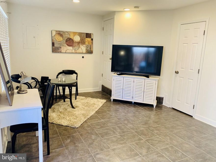 Basement ONE ROOM ONLY plus Full bath. Studio apartment for rent...perfect for one person.  Plenty of room for a bed, dresser, TV small table and chairs. Kitchenette with refrigerator, microwave, dishes, cups, silverware. There is a full bath and closet. Tenant will have a private rear entrance and access to the backyard and grill. Landlord will reside upstairs. No washer and dryer. Utilities  included.