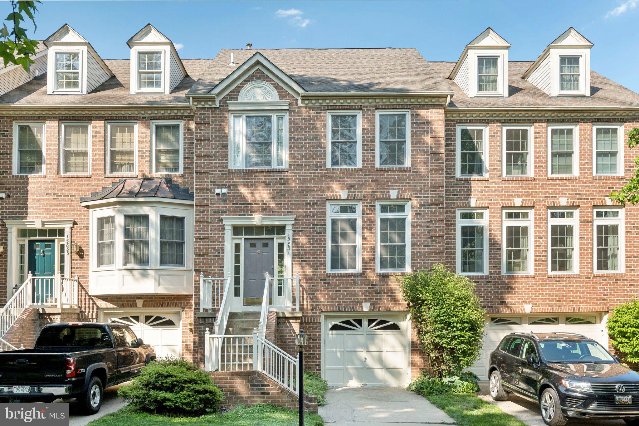 Rare Opportunity—Spacious Luxury Townhome Backing to Trees & Trails!
Beautifully maintained and move-in ready, this luxury townhome offers a private setting on a tree-lined street backing to landscaped common grounds with walking paths. Enjoy your own driveway, one-car garage with 4' x 9' extra storage, and abundant unassigned parking.
Inside, fresh paint and plush carpet complement a light-filled layout with 9’ ceilings and transom windows. The main level features a formal living room and elevated dining area with decorative columns. The spacious kitchen offers ample cabinetry, an island, recessed lighting, and a window over the sink with views of the deck and greenery. Includes a side-by-side fridge with ice/water, electric cooktop with downdraft, and a sunny breakfast room with French doors to the deck.
Upstairs, the owner’s suite impresses with vaulted ceilings, a large walk-in closet, and a dramatic loft with skylights—ideal for an office or retreat. The ensuite bath features dual vanities, soaking tub, and separate shower. Two additional bedrooms share a hall bath, with linen closet nearby.
The walk-out lower level includes a cozy wood-burning fireplace with fan, a wet bar, full bath, laundry/utility room, and French doors to the backyard.
Exceptional location near shops, dining, parks, medical centers, and Quince Orchard schools. Library and Metro bus at your doorstep.
Don’t miss this rare opportunity in a sought-after neighborhood—schedule your showing today!