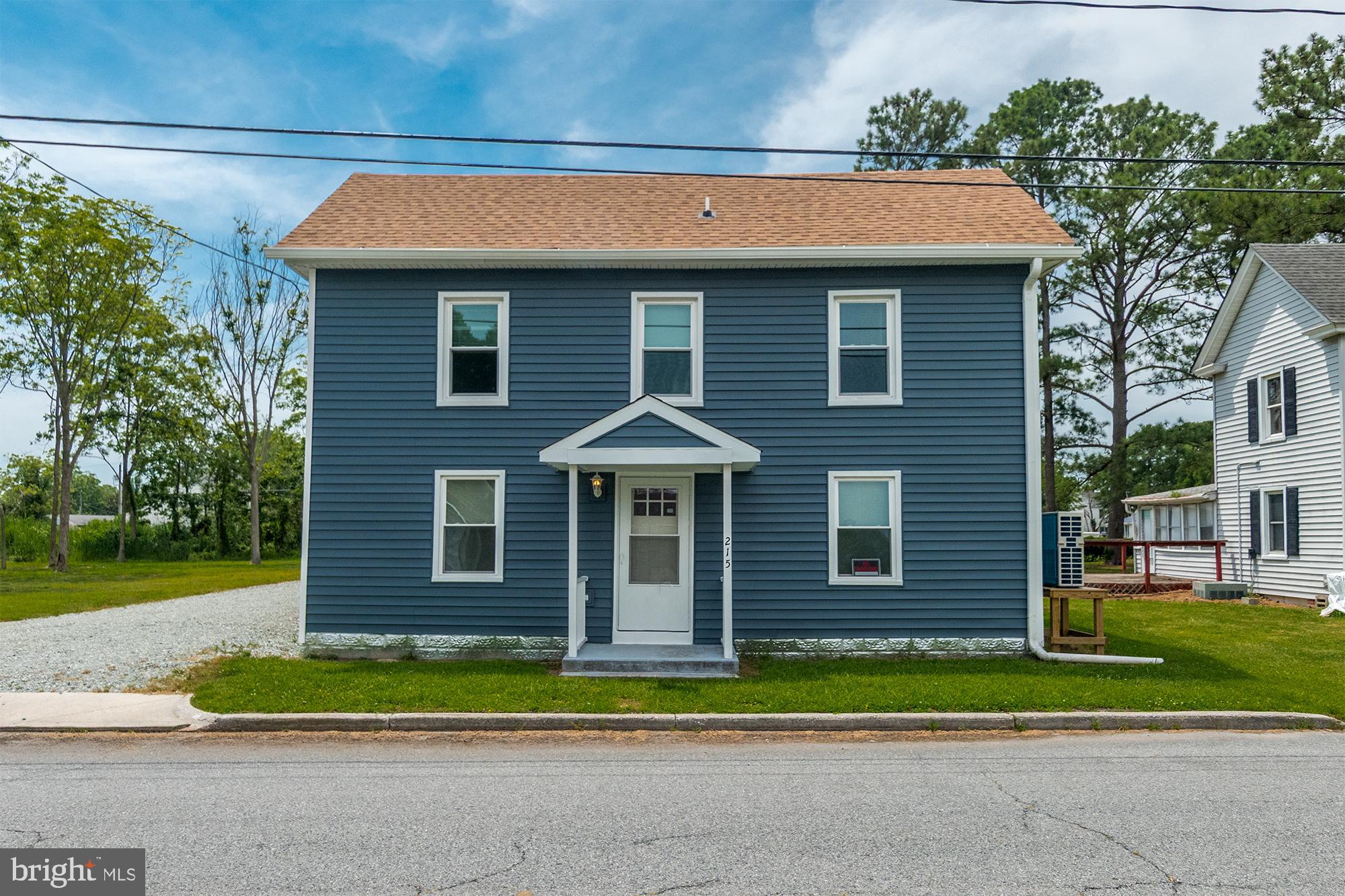 Come take a look at this FULLY REMODELED 3 bedroom, 2 bathroom farmhouse located in the historic waterfront community of Crisfield. Everything is new....... Stainless steel appliances, kitchen countertops, cabinets, pantry, roof, vinyl siding, insulation, electric, plumbing, septic connection, hot water heater, washer- dryer, windows, HVAC mini-splits, electrical fixtures and ceiling fans, recessed lighting, LP and carpet flooring, paint, storm doors and baths. EVERYTHING!!!!! Downstairs boats a master bedroom/bath suite with a large walk -in closet and a recently finished 4 season room/private laundry. There are two bedrooms and one full bath up stairs. Outside, one will find a remodeled 28x40 foot 2 bay detached garage and a workshop with electric, cement floors, a work bench, up stairs storage and a new metal roof. Bring your boat, fishing poles and move right in. Two vacant, adjacent residential building lots (Tax Id Number 2007120923 and 2007120869) can be purchased separately for $20,000 each.
