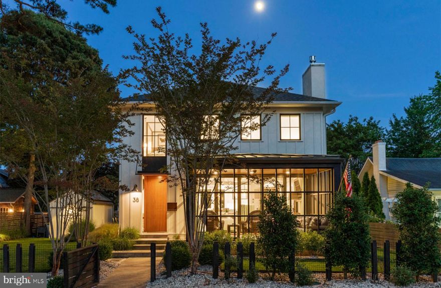 Architecturally stunning describes this designer getaway in “The Pines” neighborhood of Rehoboth Beach. Perfectly positioned within .25-mile of the ocean, this exceptional home is a superlative blend of an ideal coastal setting, timeless style, coastal sophistication, and energy efficiency. The property comprises a main home, guest cottage and detached garage designed by the award-winning SEA Studio architecture firm and constructed by Beachwood in 2019. Situated on an oversized 75’x 100’ parcel, the main house of 38 Oak Avenue features 3,229 sf of heated living space including 4 bedrooms, 4 full baths, 2 half baths, casually elegant living spaces, and a fully finished basement. Upon entry, clean lines, neutral color schemes, tasteful décor and floor to ceiling windows make a dramatic impression. Floating, reclaimed wood shelving, exposed beams, wide plank hardwood flooring, and shiplap accents are just a few of the elements carried throughout the home. The gourmet kitchen is complete with a commercial grade 6+ burner Wolf range, Sub-Zero refrigeration, dual dishwashers, dual sinks, wine fridge, oversized island, and crisp, white quartz counters. The kitchen area is connected to the natural environment by an oversized glass door which opens to a cypress deck perfect for alfresco dining overlooking the meticulously landscaped yard. The first level living room is very comfortable with a gas fireplace and NanaWall system that leads to the cozy screened porch. The second level is host to 4 bedrooms complete with beautifully tiled en-suite baths, and the lower level is host to a media room, home gym, laundry room, and half bath. The separate 370 sf guest house consists of a beautiful living area, 1 bedroom, 1 full bath, laundry, sleeping loft, and kitchenette. The exterior features include an elevated deck, fire pit area, dual outdoor showers, privacy fencing, exquisite landscaping with lighting, ample parking, and detached garage for all your beach toys. While this home is visually striking the systems are equally impressive. The solar system offsets the home’s energy consumption, Sonos sound, and the Control4 smart home technology allows the owner to manage the systems of the home remotely. This award-winning home offers extreme convenience to Rehoboth’s gorgeous beaches, state parks, boardwalk, restaurants, and all the amenities of downtown. This home will certainly leave a lasting impression!