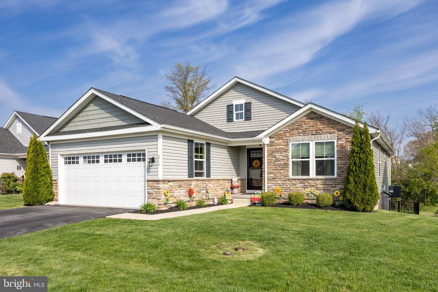Not age-restricted, this home offers the ease of one-floor living often sought in 55+ communities, while welcoming a wide range of lifestyles. 
Tucked on a small, low-traffic street within the sought-after Legends of Sadsbury Park community, this beautifully maintained ranch offers the perfect balance of peaceful living and everyday convenience.

From the moment you arrive, the curb appeal stands out with lush landscaping and charming stone accents. Inside, the open-concept layout creates a seamless flow, anchored by a modern kitchen featuring stainless steel appliances, a spacious island, pantry, and crisp white cabinetry. The kitchen opens effortlessly to the living room and dining area.  The dining room is currently being used as a second den, showcasing its versatility.  It could easily function as a playroom, home office, or traditional dining space depending on your needs.

Sliding doors off the eat-in kitchen lead to a low-maintenance trex deck with privacy screens, overlooking a fully fenced, private backyard. Even better, the HOA takes care of the grass cutting, so you can spend more time enjoying the space instead of maintaining it.

The main level includes three bedrooms and two full baths. The primary suite offers a large walk-in closet, dual sink vanity, and a walk-in shower. Two additional bedrooms, a full bathroom with accessible features, and a convenient laundry area complete the floor.

Downstairs, the full, unfinished walk-out basement provides endless possibilities for future living space, a home gym, or simply great storage.

Living here means enjoying a lifestyle as much as a home, with community walking paths, a sports field with soccer and lacrosse nets, a playground, pool, and recreational facilities. Just minutes away, you’ll find shopping and dining at Sadsbury Commons, plus everyday essentials like Penn Medicine with urgent care. Local favorites like Harry’s Hot Dogs and Athena Ice Cream, Coffee, and Baked Goods are close enough to enjoy anytime.

If you’ve been looking for easy, one-floor living in a vibrant community with everything nearby, this is it. Schedule your private showing and come see how effortlessly this home fits your lifestyle.