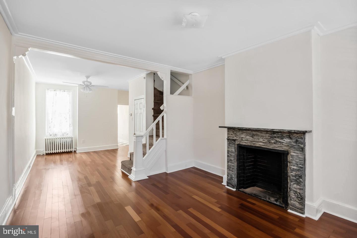 Tucked away in the heart of Northern Liberties, 924 N Randolph Street offers a charming 3-story brick home just steps from top restaurants, shops, and entertainment. The open living area features hardwood floors, high ceilings, original woodwork, and a cozy wood-burning fireplace. The classic black-and-white kitchen includes a full appliance suite, skylight, and access to a private rear patio with room to relax, entertain, and garden. Upstairs, you’ll find a full laundry room, updated bath, and three sunny bedrooms across two floors. The dry basement provides great storage and updated systems. With everything from grocery stores to gyms and transit nearby, this home delivers the best of city living in one of Philly’s most loved neighborhoods. Schedule your showing today!