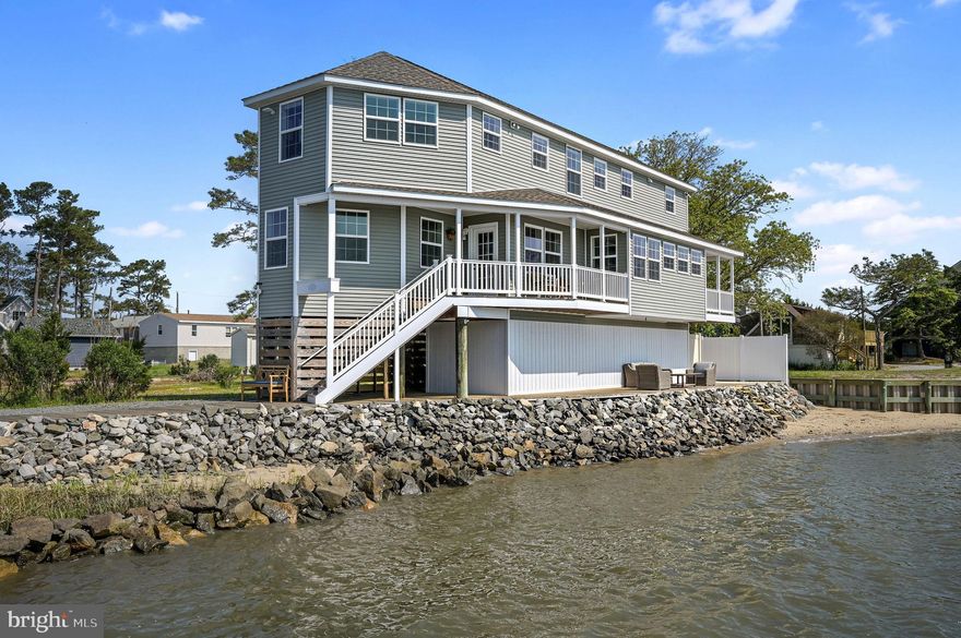 Welcome to “River’s Edge”, enjoy stunning Indian River Bay views from this beautifully maintained 4 bed, 3 bath waterfront home. The open-concept kitchen, dining, and family room offer panoramic water views from every angle. Main level bedroom is currently set up as a reading nook a peaceful spot to enjoy the view. A dedicated office with built-ins provides the perfect work from home space. 

Outdoor living shines with a bayfront balcony, ground-level deck, private steps to the water, and a sandy beach ideal for crabbing, fishing, and watching sunsets. A long private dock lets you dock your boat or jet ski. or enjoy quiet mornings on the water. The home also includes an outdoor shower, kayak rack, and a large exterior storage closet.
Upstairs are two guest rooms and a primary suite with incredible bay views .  plus a bath with heated tile floors and convenient stackable laundry.
Turnkey and ready to enjoy—close to restaurants, marinas, and nearby beaches. Sale includes road (road maintenance agreement to be completed)  and  lots# 12 , 13 and 14. 
Previous Home inspection  and wdi completed in Sept of 2024 available 
Owner is a Delaware-licensed  Realtor. Listing agent is related to seller.