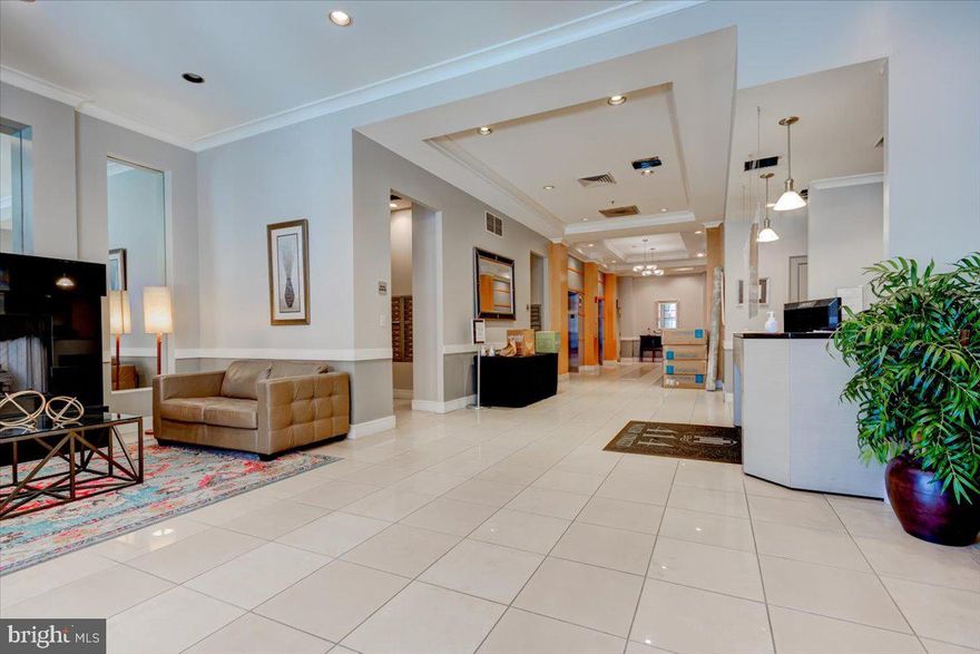 Beautiful Inner Harbor Baltimore Views is what you come home to when your new address is : 414 Water St Unit 2001.

Minutes from the attractions that Waterfront Downtown Baltimore has to offer, you are welcomed by friendly staff into this concierge lobby with secure access, gleaming floors and elevator access. As you enter the unit, you are met with an expansive open concept living space - 
that carry you  into the kitchen and living room. Cook up gourmet meals in this granite countertop, stainless steel appliance Kitchen - perfect for indoor entertaining and  through the sliding doors
step out and enjoy a cool drink on the spacious balcony with spectacular views of of the city. The two large bedrooms offer plenty of living space , with the master suite boasting a generous sized walk in closet, large windows that fill the rooms with plenty of sunlight . This Unit comes with its own stacked Washer Dryer unit,
NEW CARPET extends into each of the bedrooms, FRESH PAINT on the walls - invite you to make this your own piece of heaven - away from the bustling city, yet in the very heart of it. 

As you step out into the building you experience luxury and convenience at your fingertips ; with a roof deck Swimming pool, A fully furnished fitness center, Club room perfect to hang out, lounge and make new friends over a game of Foosball. A dedicated covered parking spot  conveys with this Unit.

THIS  could be your new home!!! Do not Miss.