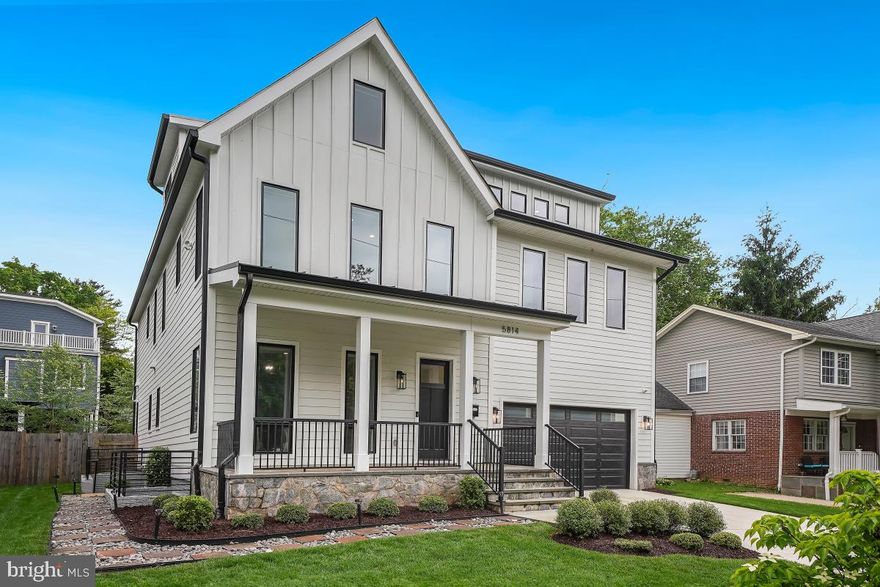 Built in 2021, this better-than-new, barely-lived in home features 6 bedrooms, 5.5 bathrooms, a third level au pair/guest suite and bonus room, two laundry rooms, and a lower level apartment in a four-story, modern farmhouse design. Impressive curb appeal and a welcoming front porch introduce this outstanding property. Greeted by the main-level library/office with French doors, the foyer opens to the dramatic open-concept living area. The kitchen—which showcases a large, centered waterfall island with a breakfast bar, Fulgor Milano appliances including double wall ovens, ample counter space and cabinetry—adjoins the dining area, which is outlined by nearly floor-to-ceiling windows and French door access to the rear porch and backyard. The dining area flows seamlessly into the light-filled living room with its modern, stone-encased fireplace. Upstairs, the second floor finds 4 bedrooms with walk-in closets and three bathrooms, highlighted by the owner’s suite with its dual walk-in closets and en-suite bath with a double vanity, glass shower, stand-alone tub, and private commode area. This level also includes a convenient laundry room. The fifth bedroom with a bathroom and an open bonus room is found on the next upper level. Access to the lower level is off the foyer or via a private, exterior side entrance. The in-law/guest suite is comprised of a bedroom, bathroom with dressing area, walk-in closet, separate laundry, living room, kitchen recreation room and entertainment area. A separate recreation room is also found here. A 2-car garage with a pebble tech floor and an electric car charger, custom window treatments—most with smart Lutron switches—10-foot ceilings, hardwood floors, energy-saving LED lighting throughout and a fenced rear yard complete this outstanding home. Perfectly located, NIH, Walter Reed, downtown Bethesda and Ayrlawn Park are just steps away. With easy access to major transportation routes, commuting to downtown Washington, DC, northern Virginia and area airports is a breeze.