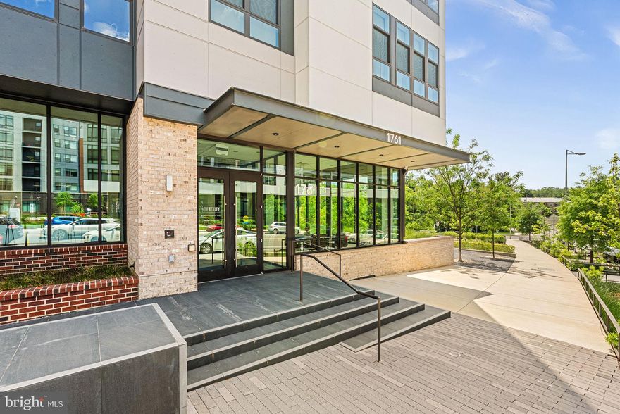 RARELY AVAILABLE FIRST FLOOR END UNIT AT THE BEXLEY CLOSE TO THE METRO AND SHOPPING!  Welcome to luxury living at its finest in the heart of McLean, VA. This sophisticated two-bedroom, two and a half bath condo at 1761 Old Meadow Road, Unit 104, offers an expansive 1,557 square feet of modern elegance and comfort. As you enter, you'll immediately notice the high-end finishes that define this exquisite residence. The open-concept living space features a stunning waterfall quartz island, perfect for entertaining, complemented by brand-new light fixtures and a linear fireplace. The gourmet kitchen is a culinary dream with stainless steel appliances and a stylish backsplash.

Abundant natural light floods through the large end unit windows, enhancing the spacious feel and highlighting the chic design. With high ceilings, this condo exudes a sense of grandeur and openness. Enjoy the convenience of an in-unit washer and dryer and walk-out patio.  

Residents enjoy an array of premium amenities, including a concierge service, a fully-equipped gym, a resident’s lounge for social gatherings, and a barbecue area for outdoor dining. The common garden offers a tranquil retreat, while the bike room and private storage options, including rental opportunities, provide ample space for all your needs. Assigned parking in the garage and access to an elevator ensure ease and comfort in this midrise gem.

Don't miss the opportunity to call this exceptional condo your new home. Contact us today to schedule a private showing.