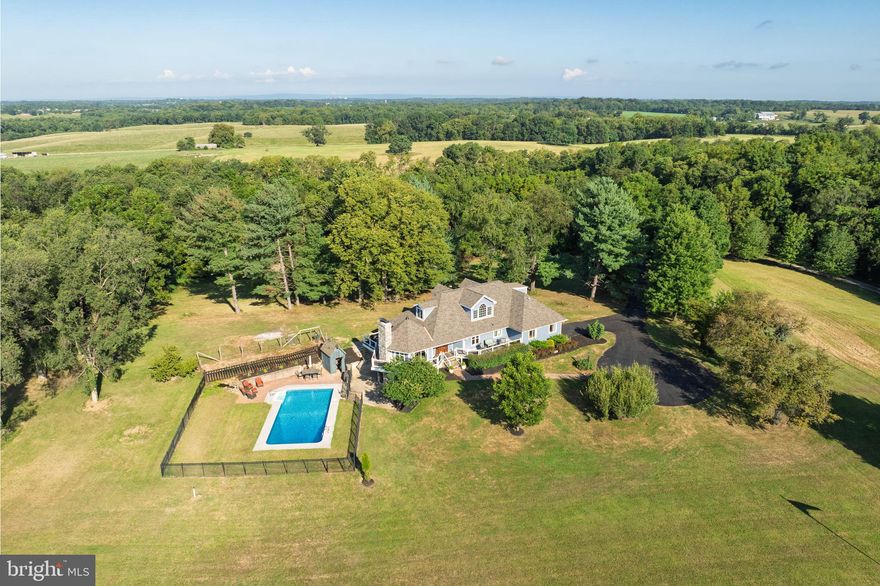 PANORAMIC BLUE RIDGE MOUNTAIN VIEWS! Premium hilltop estate with gorgeous stone and Hardiplank exterior boasting 5 bedrooms (including a main floor primary bedroom) and 4 full baths. The finished lower level is an "apartment style" private suite with a fully equipped 2nd kitchen, family room, fireplace, large bedroom, gym area and full bath. This is your chance to own a stunning home with million-dollar views where you can unwind and relax in your 20x40 in-ground pool prewired for hot tub, ready for entertaining! Large formal dining room and gourmet kitchen with granite counters and upgraded appliances that walks out to the wrap porch and outdoor eating area. Warm up on cold winter nights near the 2 cozy fireplaces and 2 zone HVAC.
Watch the sunrise over the Blue Ridge Mountain from your maintenance free wraparound front porch and watch the sunset over the pastoral farmland from your back porch.  Only a short distance from Sam Michaels Park, Shenandoah River & historic Harpers Ferry WV where you can board the MARC Train for an easy commute. Perfect location to enjoy whitewater rafting, tubing, ziplining, premiere hiking & riding trails, cycling on the C&O Canal and so much more!  Easy access to Rt 340, Rt9 & I-70. NO HOA so bring all your furry friends & horses (this would make a lovely farmette, with neighboring horse farms making it perfect for the equine enthusiast).  This home sparkles with NEW PAINT & NEW ROOF! All showings are by appointment only so call today to schedule your private showing before its gone!

IMPORTANT!  PLEASE TURN OFF ALL LIGHTS AND LOCK ALL DOORS AND GARAGE DOORS BEFORE YOU LEAVE AND MAKE SURE THE KEY IS IN THE LOCK BOX


**The buyer is to verify information provided and related to the property that is material to a buyer’s decision to purchase the property. All documents and other information attached to this listing are provided as a courtesy and should be researched and verified by the buyer’s agent.