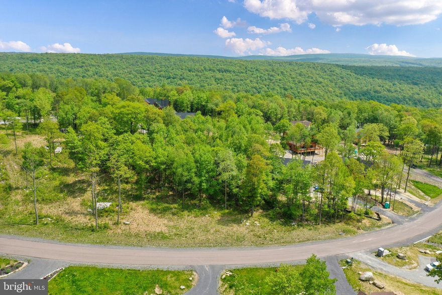 Beautiful new construction home to be built by Dixon's Contracting, Deep Creek Lake's most popular builder!  Bring your builder or use ours! A huge library of floorplans is available, or we'll create a custom floorplan for you!  This price is for a one-level rancher with an unfinished basement. 3 bedrooms, 3 full baths, 1 powder room, and plenty of room to spread out! Almost 2000 finished square feet on the main level! Spacious kitchen with a huge island and stainless steel appliances! Huge great room with a fireplace! Covered front porch and covered rear porch also with a fireplace for outdoor entertaining! 1st-floor laundry room too! You select your finishes! This home would sit on a beautiful 1/2 acre lot in the North Camp Ridge section of the exclusive and gated North Camp Community with spectacular mountain views! Public water and sewer hookups are available! High-speed internet is available in the community!  Low HOA fee covers common area maintenance, snow removal and road maintenance, and walking trails!