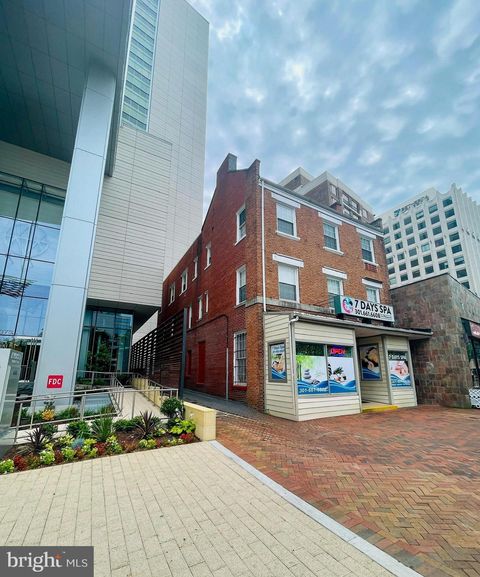 Photo of 7347 Wisconsin Avenue #303, BETHESDA, MD 20814 (MLS # MDMC2211188)