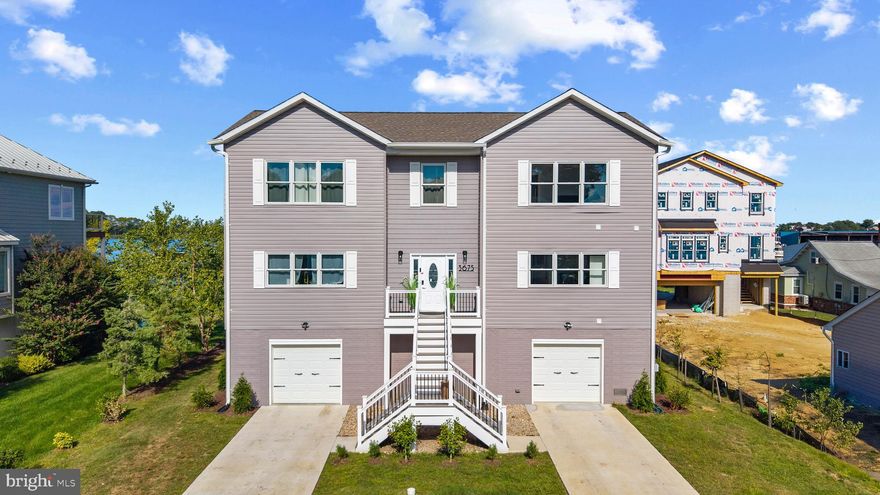 This is the one you've been waiting for!

Welcome to 3675 1st Avenue, a stunning new construction (2024) home located in the desirable Selby-on-the-Bay community of Edgewater with waterfront access and shared pier!

Experience the peace and intense relaxation associated with living on the water in this beautiful new build  which features a wrap around deck and five 12 foot sliding doors that open six feet wide, allowing true inside/outside living. Fall asleep to the sound of the waves crashing against the shore.

The open-concept main level has a large living room (with electric fireplace), dining room, and gourmet kitchen. Kitchen features a ten burner double gas stove/oven and an oversized center island. Laundry and powder room are conveniently located on the main level as well as a full secondary owner's suite!

The upper level owner suite features a walk-in closet and spa-style en-suite bathroom with a 72 inch standalone tub. The generously sized secondary bedrooms get plenty of natural light and have ample closet space. 

The lower level is a two car garage with an enormous amount of storage space. Space under stairs has been fitted and plumbed for a bathroom. 

The large level yard, is ideal for entertaining or gardening. Property has not one but two driveways that will easily accommodate four cars. 

Other Highlights: 

Bamboo flooring throughout
Smart hub light switches
Hot water heater is tankless propane (continuous water 24/7!)
Well and septic are Mayo City

This is a rare opportunity to purchase new construction in one of Edgewater’s most sought-after waterfront communities. Just minutes to Annapolis, major commuter routes, and local marinas. Schedule your showing today!