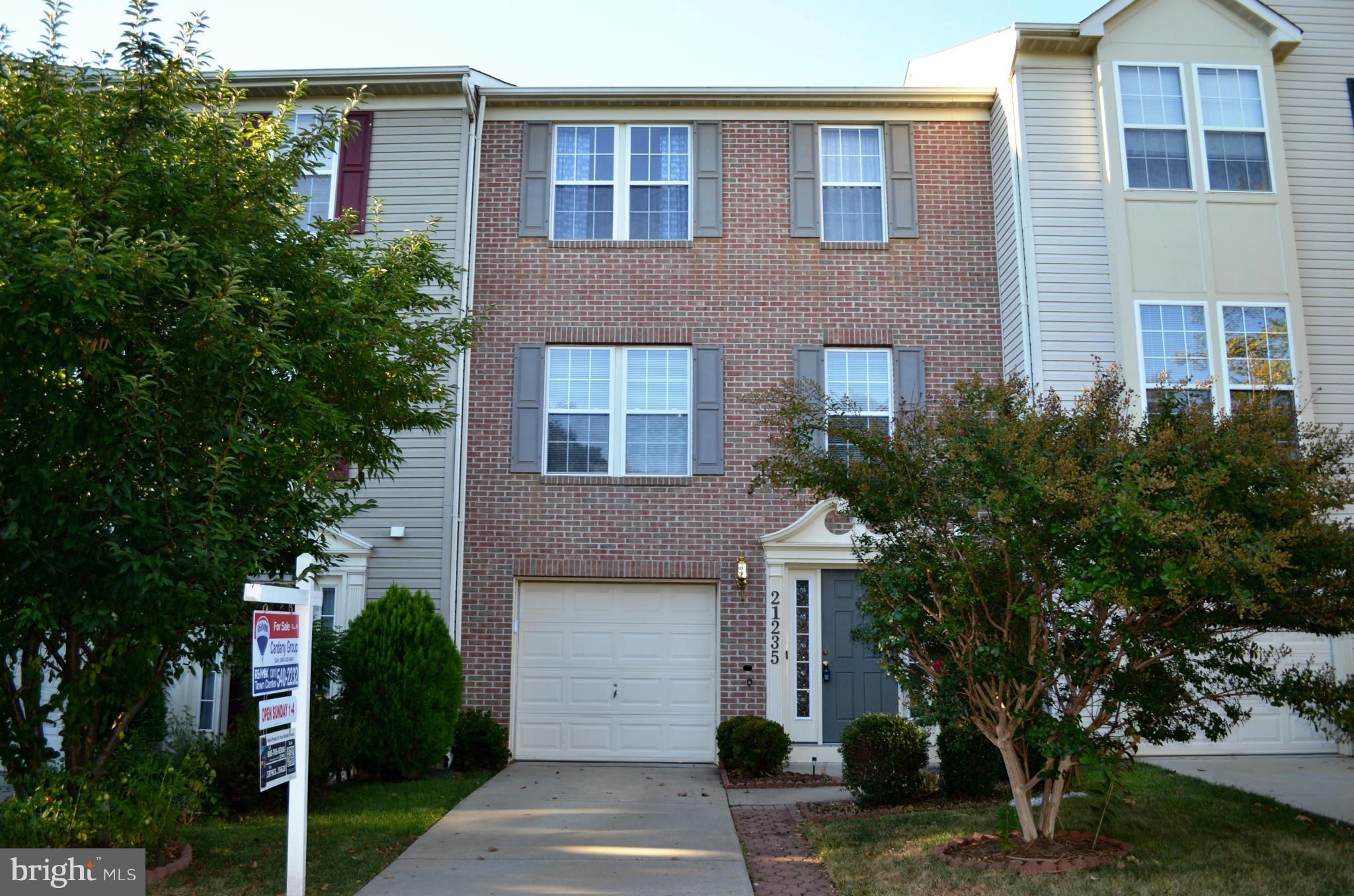 Move In Ready! Largest model in the Milestone community.Brick front,12-foot bumpout all three levels,expanded family room on entry level, light-filled morning room w/gas FP, spacious sitting area off MBR and large,master garden bath w/sep shower/soaking tub.Hardwood floors on mid-level/hardwood stairs.Garage w/driveway for add'l parking. Great location! Close to Wegmans,schools,shopping,I270.