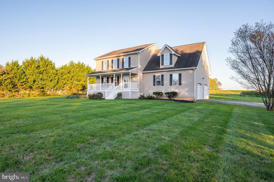 Enjoy peaceful country living  in this immaculate two story Colonial home on 1.3 flat acres of trees, spacious lawns and  gardens w/NO  HOA, featuring 4 bdrm (septic system is rated for 3bdrm),  2 1/2 bath,  well landscaped and backed by farmland, bordered by trees, with a double car oversized attached garage w/ built in workbench and shelving and full unfinished bsmt.  The fresh air, open spaces and mature  trees  are  home to birds of all kinds  and families who care about their neighborhood.     

A graceful driveway brings you to the attached double garage and well  landscaped front entrance offering  a deep  house wide covered porch for viewing  sunsets and relaxing  year round.  To the front you’ll have spacious lawns and mature trees, to the back lots of  space to recreate, as well as enjoy nicely  planned gardens, large  fenced areas for  pets and  a  substantial raised  chicken coop and fenced area  with clear views to the sunrise and farmlands from the back  deck. 

Inside the front entrance is a custom slate tiled  foyer and hallway w/ coat closet,  leading to the guest bath and gorgeously  tiled kitchen.  The high end windows thru out the home are all custom fitted with attractive  slat blinds.   To the left of the entrance foyer and hall you’ll find the living room,  with plenty of windows, and thru an  archway you’l love the dining room portion of the open concept kitchen, with its own handsome built in cabinetry and beverage station.  This is a well designed, beautifully appointed open kitchen with lustrous granite counters and extra attention paid to the artisanal lighting fixtures and amazing rich  wood cabinetry with soft close drawers offering  an enormous amount of storage, incl built in roll out pantry shelving.   All stainless appliances, an  extra wide casual eating area at the granite counter with a double copper farm sink overlooking sunrise and gardens on property. Also, enjoy a brand new deck with steps leading down to the back yard.  

Wood stairs and bannister lead from the main level in the foyer to the upper level bedrooms with an extra newly finished room for office, library, or guest area.  The primary bedroom features a custom tray ceiling and fan, large windows overlooking the back yard, and an ensuite bath with custom tiled flooring and surround for the shower. A double sink vanity, mirrors  and cabinetry offer plenty of storage space and the walk in closet with its built in closet system/ shelving is terrific.   Two more newly carpeted bedrooms w plenty of light,  closets and ceiling fans are off the upper hallway with their own full bath and linen closet.   

Main level Interior stairs lead to the full unfinished basement, which has the laundry area and separate stairs access to garage .  A high capacity heat pump serves all the home’s heat and AC needs.  

This is a refreshing well cared for property with a truly lovely move in ready family  home,  perfect for rural relaxation yet only an 8  minute drive to Shepherdstown’s  shopping, cultural events, services, casual and fine dining and recreation as well as the Potomac River for fun , the C&O trail biking and hiking, and Shepherd University.