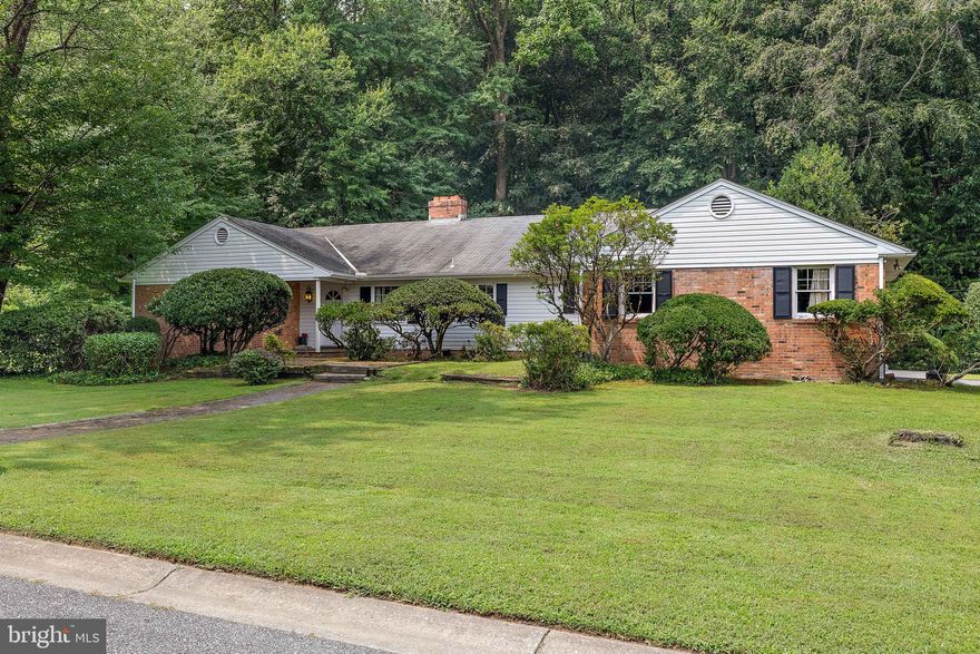 Unlock your inner designer flair at 19 Harlech Drive, Wilmington, a unique renovator’s dream nestled in the charming community of Anglesey in Greenville. This 4-bedroom, 2.1-bathroom mid-century brick ranch has solid bones, great flow, and hardwood floors throughout. Its approximately 2,400 square feet provides a great opportunity for your creative touch. Step inside to discover a single-story layout boasting a living room with a custom brick fireplace, and a dining room primed for memorable gatherings. This home was built with entertaining in mind with great flow for both indoor and outdoor parties. The vintage kitchen and baths are ready for modern flair. Enjoy breakfast with ease in the breakfast room and store your culinary treasures in the walk-in pantry. The main floor features two bedrooms with a shared full bath off the main hall. A generous primary suite offers numerous closets and a private bath. The 4th bedroom would work perfectly as a home office. Venture downstairs to the walk-out lower level, where a recreation room with a second fireplace promises additional entertainment possibilities. Outside, revel in over half an acre of privacy and tranquility backing to woods, providing the ideal backdrop for outdoor adventures or simply soaking in nature’s beauty. It's not just a home; it's your next project. Unleash your imagination and transform this property into the envy of the neighborhood.