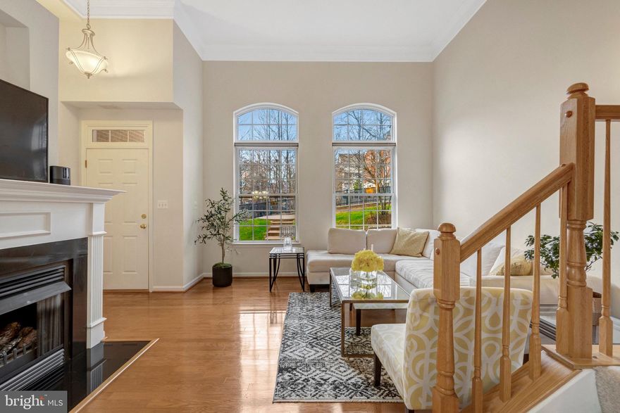 Fabulous location in Fair Lakes!  This lovely TH condo has 2 levels, 2 bedrooms, 2.5 baths, 1 car GARAGE, 1184 SF and a gorgeous tree lined courtyard out front. ••  New/fresh paint throughout, including the garage.  •• New CROWN MOULDING throughout the home! •• HARDWOOD on main level. •• LIVING ROOM with gas fireplace, 13' cathedral ceilings and 8' extra tall windows to take in the view. ••KITCHEN & DINING ROOM w/ stainless steel appliances, granite counters, a bar/island w/ stainless double sinks, recessed lighting and room for a large table. (The stove is gas and has a warming oven) •• Upstairs you'll find a charming BALCONY off the PRIMARY SUITE, plus a walk-in closet, bathroom w/ double vanities, stand alone shower, plus a soaking tub. •• Also upstairs is a second bedroom , the hall bath and a linen closet. •• Washer/Dryer on the upper level!! •• Living Room & both bedrooms are wired for ceiling fans/lighting. •• WATER INCLUDED! ------->>>> East Market at Fair Lakes is incredibly convenient: Walk to Whole Foods, Starbucks, Club Pilates, Row House, Pei Wei Asian Kitchen, UFC Gym, Radiance Med Spa, UPS Store, Kohls, a nail salon and more! •• Get to Fair Lake Shopping Center in 2 minutes: Target, Walmart, Home Goods, DSW, Petsmart, Michaels, Guapos, Best Buy, Ulta... and that's just a portion of the offerings. And of course, don't forget neighborhood favorite Tony's Pizza! ••• I know the trees out front look bare now but you will love it when the trees fill in this spring, the courtyard is absolutely beautiful! ••• Easy access to 66/50/286 & FREE Fair Lakes Shuttle to Vienna Metro (orange line)!