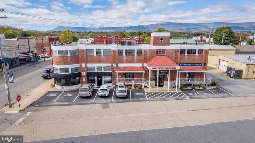 Discover a unique investment opportunity in the heart of Elkton! Welcome to The Loading Dock, a versatile 11,916 SF commercial property ideally situated in the Town of Elkton, VA. This well-maintained building has seen numerous updates and is fully leased, making it a prime option for an investor or owner-operator ready to step in and manage. Current tenants include a salon, professional office, a vintage retail shop, a church, and a Pilates studio, offering a diverse and stable income stream. Zoned B-1, this property supports a wide range of commercial uses. Additional highlights include 8 dedicated parking spaces with abundant public parking nearby, ensuring easy access for tenants and customers alike. This is a rare chance to own a prominent income-producing property in a thriving community location.