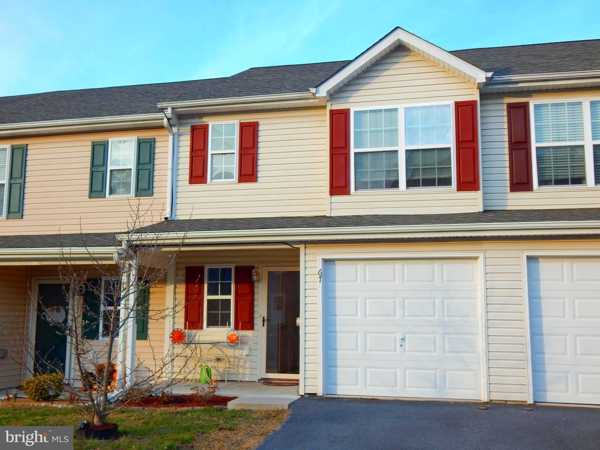 Welcome to 67 Myatt Court! This Fabulous 2-level starter townhome in Inwood, is move- in ready for the new year! This humble abode has 2 Large bedrooms, each with a full bath (great for guests OR if you want a roommate)! The Beautiful laminate on main level makes it easy to keep clean. The fully fenced back yard with patio, is great for grilling, entertaining, pets and privacy . A one-car garage has storage space and there is a driveway for extra parking. This home has new paint and brand new, never-been-lived-on, carpet throughout the upper level. The Washer and Dryer convey! Come see it now!