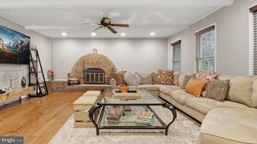 Motivated seller - priced to sell.    This charming 5-level split-level home offers a perfect blend of comfort and functionality, making it an ideal retreat for those seeking a warm and inviting atmosphere. With 6 spacious bedrooms and 4 full bathrooms, there's ample room for relaxation and privacy. The traditional floor plan features beautiful hardwood floors throughout, enhancing the home's cozy ambiance.

The heart of the home is the eat-in kitchen, equipped with modern appliances, including a built-in range, dishwasher, and refrigerator, making meal preparation a delight. Enjoy casual dining in the kitchen's table space or host formal gatherings in the separate dining room. The living area boasts a lovely brick hearth and  fireplace, perfect for cozy evenings, while ceiling fans and double-pane windows ensure comfort year-round.

Step outside to the enclosed porch, a serene spot for morning coffee or evening relaxation, and take in the tranquility of your surroundings. The attached side-entry garage provides convenience, with additional driveway space for guests. The laundry area is conveniently located in the basement, streamlining your daily chores.

With a total finished area of 3,038 sq ft and one additional unfinished level below grade, totaling 3,806 sq ft (per tax record/estimated), this home is designed for both entertaining and everyday living. Its good condition and thoughtful features create a welcoming space that truly feels like home.

Located across the street from Quince Orchard Knolls Park, you'll enjoy access to tennis and basketball courts, a kids' playground, a baseball field, and a nature trail just steps away. Plus, the home is conveniently close to Kentlands Market Square,  The Shops at Potomac Valley,  Downtown Crown and Rio Center, and Travilah Square for all your dining, shopping, and entertainment needs.

Don't miss the opportunity to make this delightful property your own—the perfect balance of charm, convenience, and comfort awaits!
