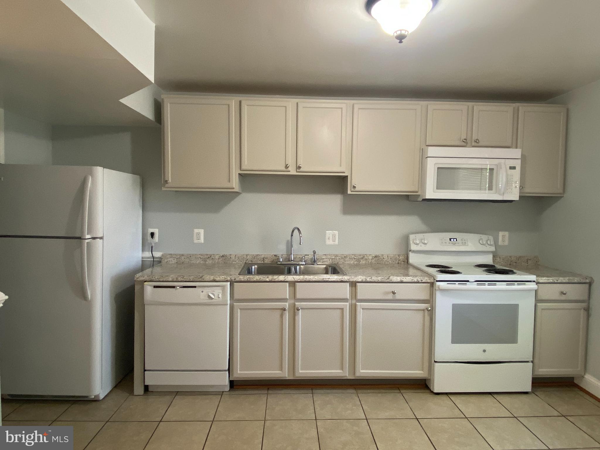 WARFIELD CONDOMINIUMS - Residential Lease