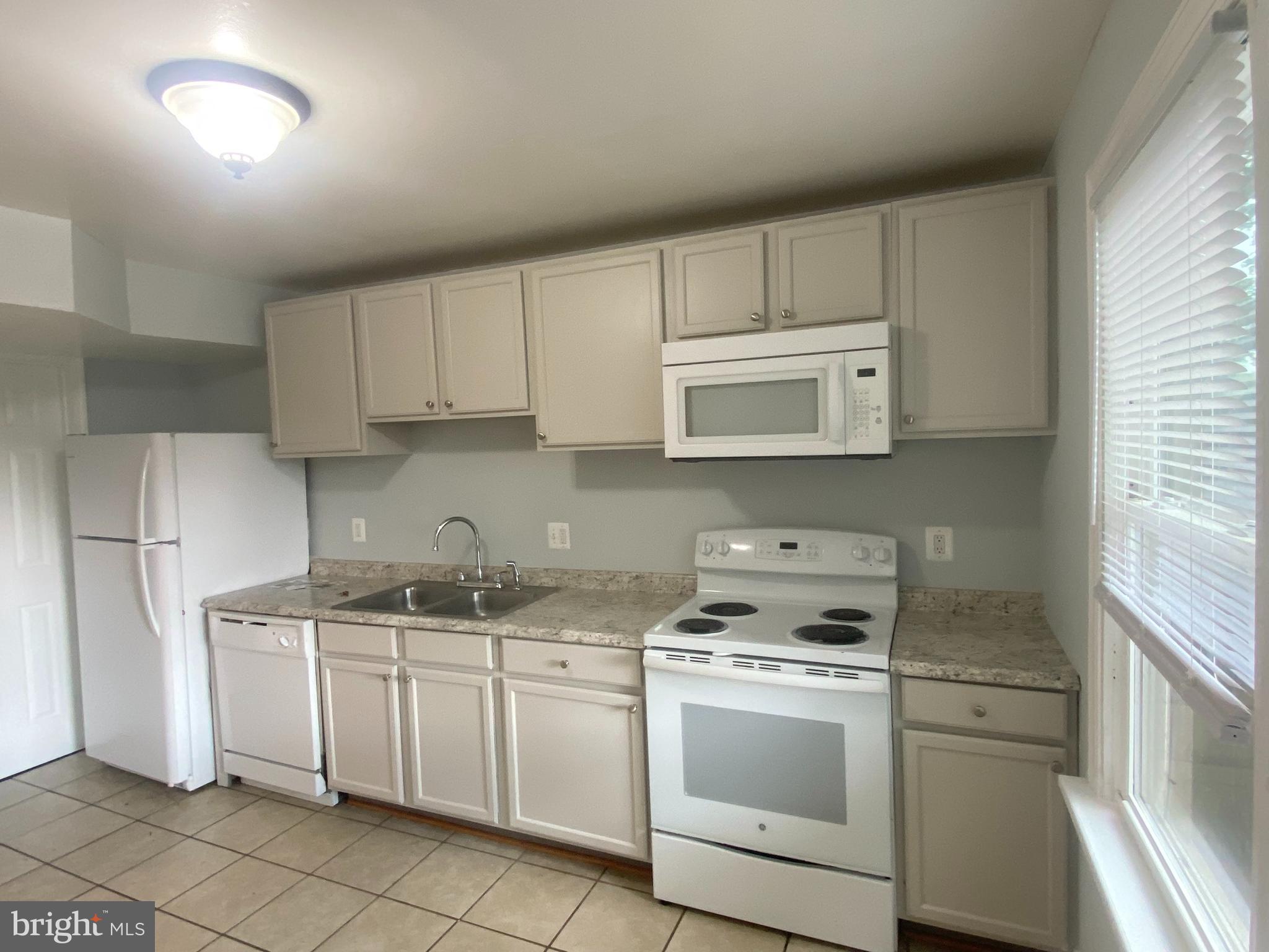 WARFIELD CONDOMINIUMS - Residential Lease