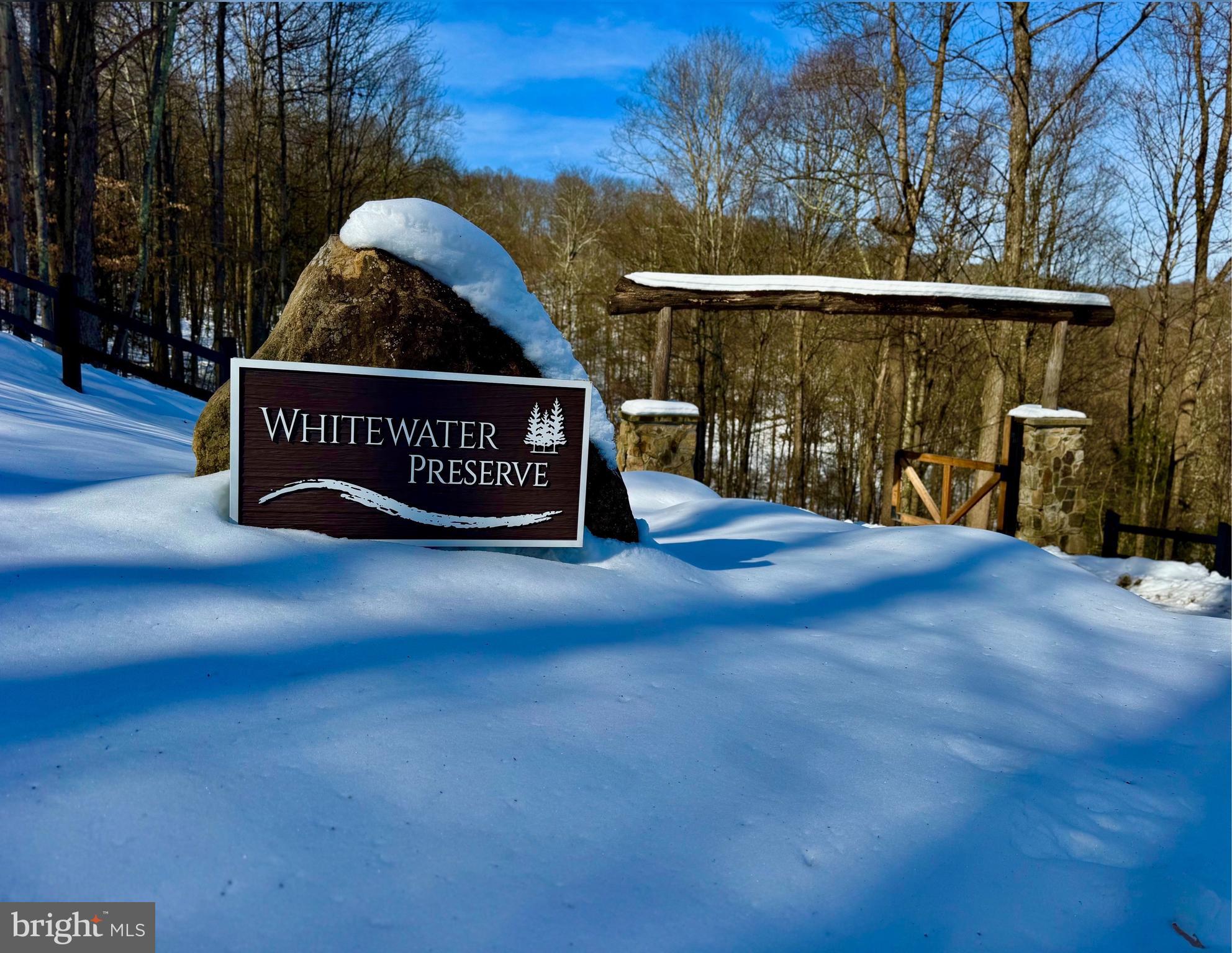 "Welcome Whitewater" Escape to gentle sounds of the Big Sandy River where privacy meets convenience on this 3.4 +/- acre lot tucked in the Appalachian Mountains of West Virginia. Just 15 +/- minutes to Morgantown this unique off grid, getaway cabin is situated in beautiful Preston County, WV. This cabin offers solar generated power, propane heat, private fire pit, hunting stands, and more. Nestled behind a gated community, offering riverfront access to 2 rivers enjoying fishing, kayaking, or canoeing! Whether it's hiking or ATV adventures through the preserve, you can find peace here. Waterfalls in the distance and privately deeded riverfront access make this HOA unique. Surround yourself in the mountains on this expandable lot to create your dream home or keep as a retreat. Availability of electric, 5G cell coverage and high-speed internet connectivity all in natures paradise. More than 20,000 acres of public lands within minutes. 10 +/- miles to Coopers Rock State Forest, 12 +/- miles to Cheat Lake, 25 +/- miles to Deep Creek Lake, MD.